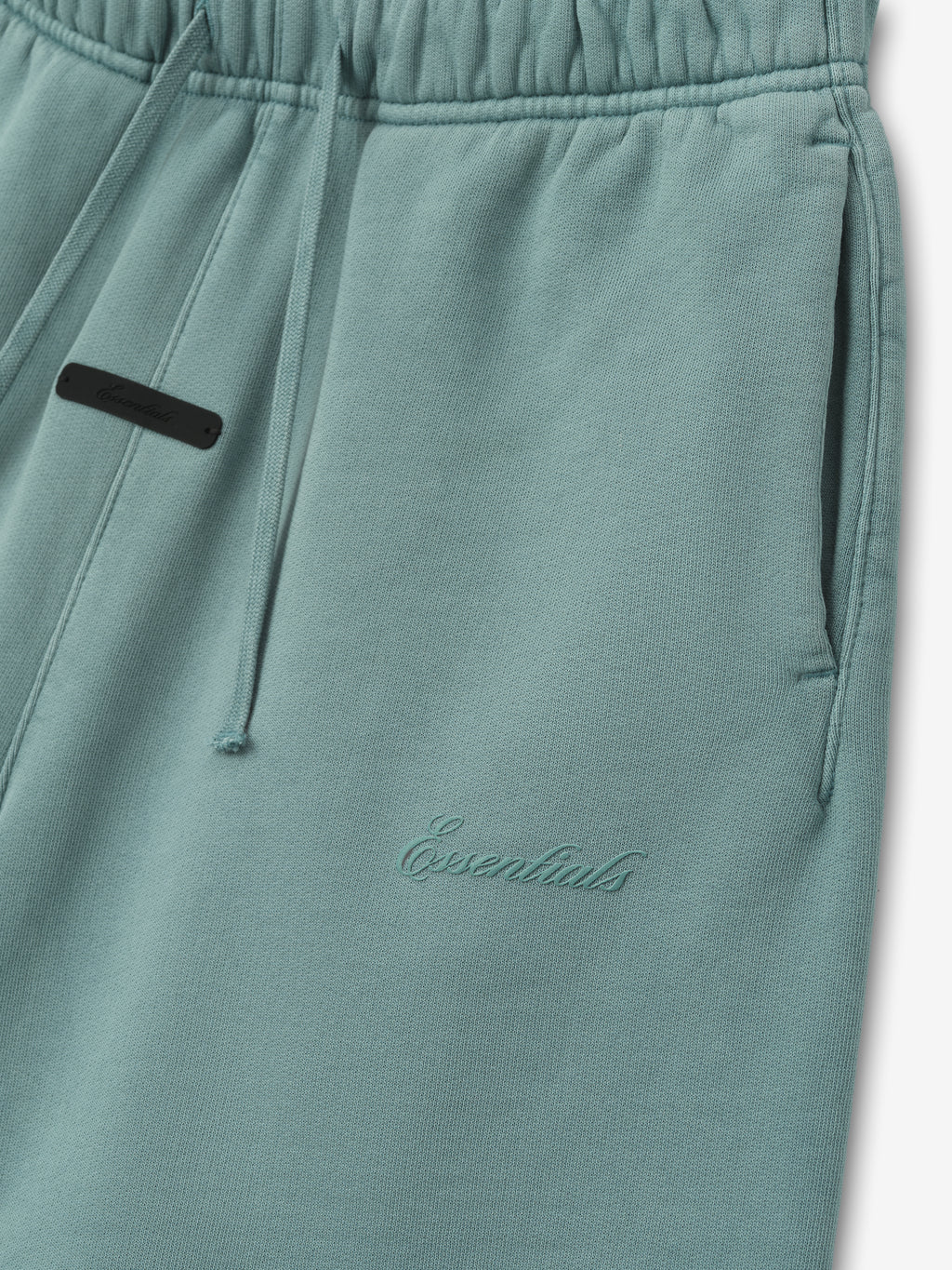 kids mid-length relaxed sweatshort in pigment-dyed 390GSM cotton fleece with elastic waistband and tonal Essentials embroidery