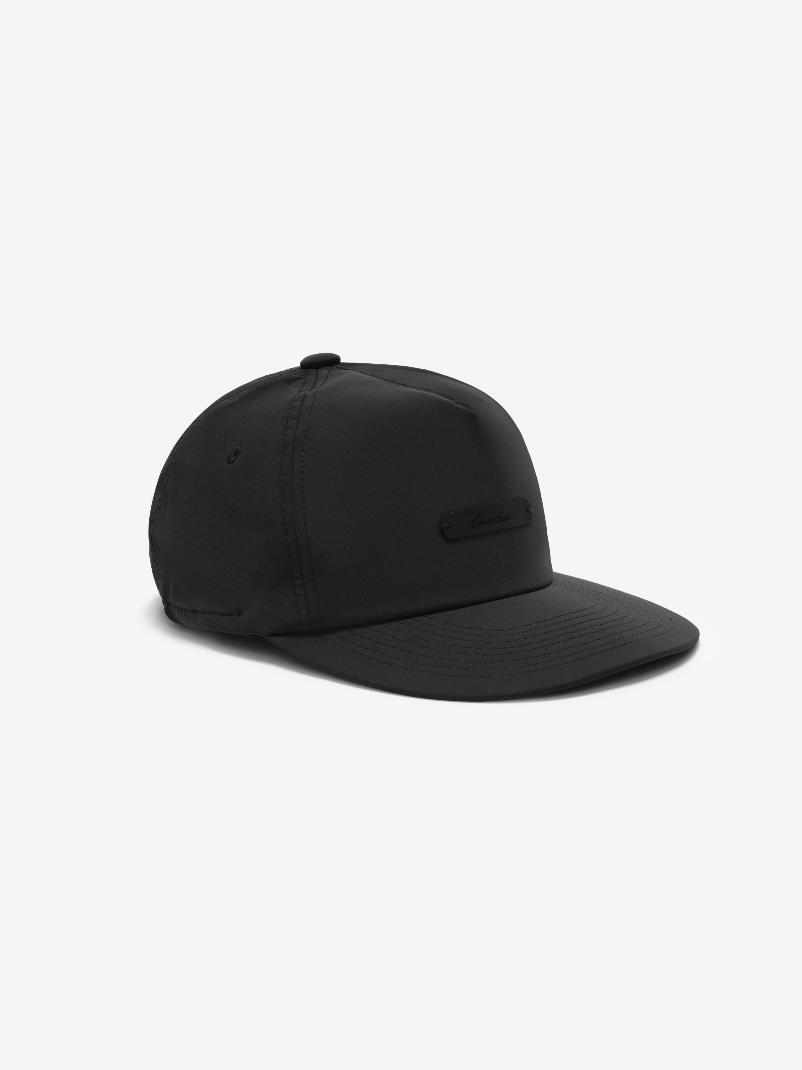 5 Panel Nylon Hat in vintage black with a smooth, lightweight nylon fabric, featuring subtle ventilation eyelets and a minimalist front logo patch for sleek casual wear.