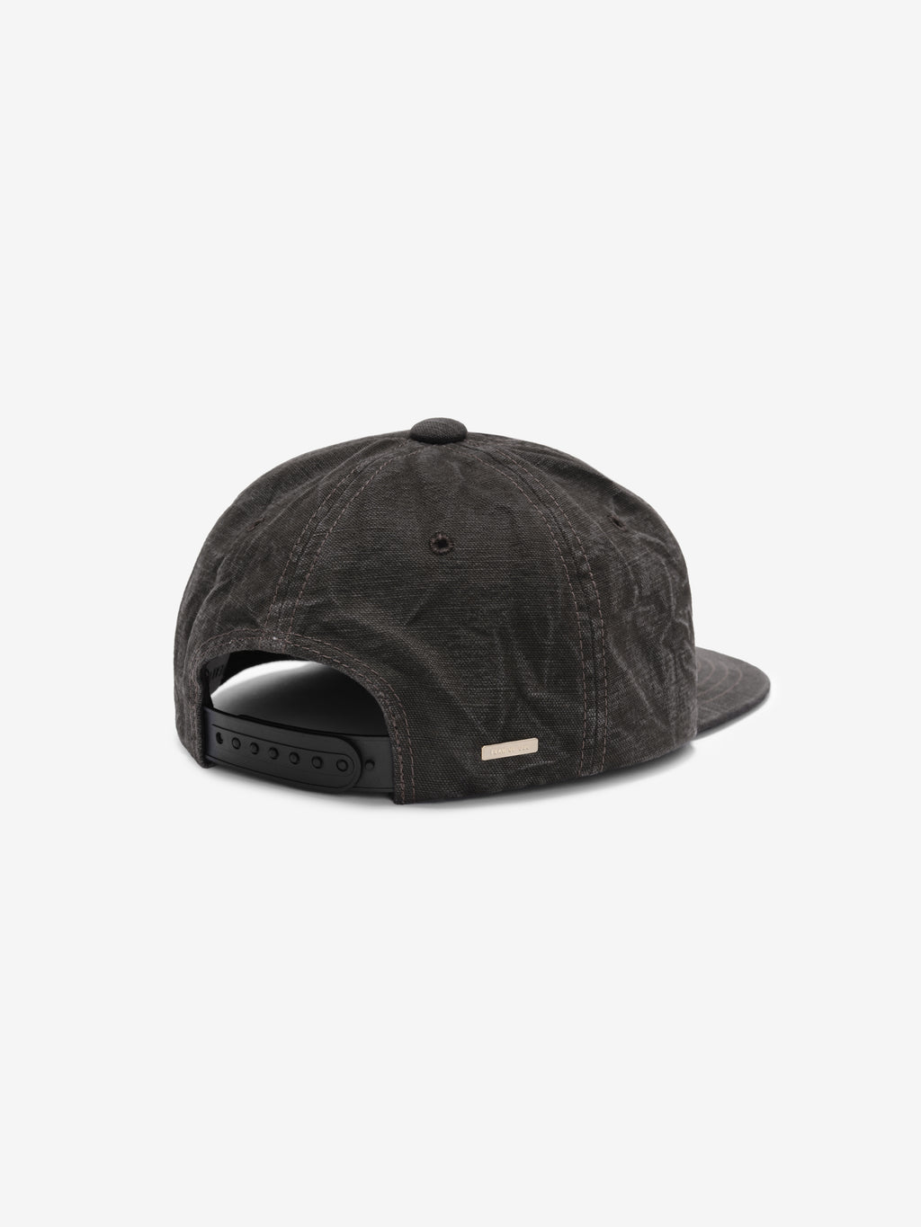 Canvas Baseball Cap in washed black shown from the back with an adjustable snapback closure curved brim tonal stitching and a small logo tab for a casual finish