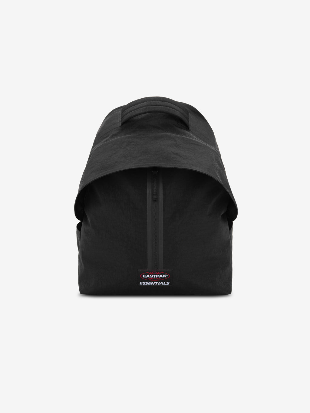 Essentials Backpack in black shown from the front with a curved top flap central zipper and small rectangular logo patch against a plain light background