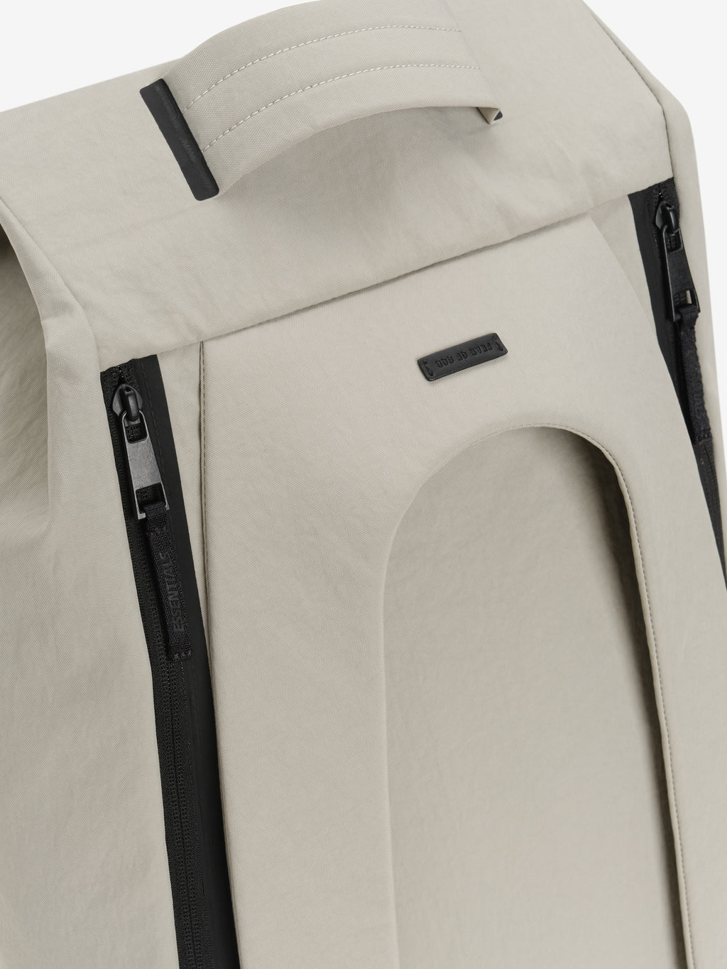 Sports Duffel in light gray close up showing a padded top handle black vertical zippers curved front pocket and subtle logo patch on smooth textured fabric