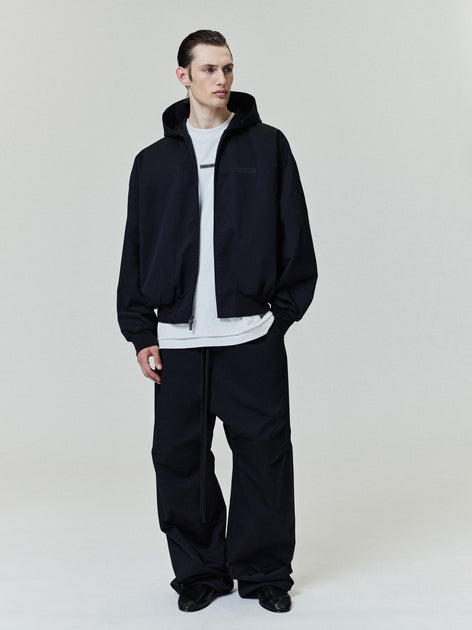 トップス ESSENTIALS / POLY COTTON TWILL HOODIE Poly Cotton Twill Hoodie in Jet Black | Fear of God