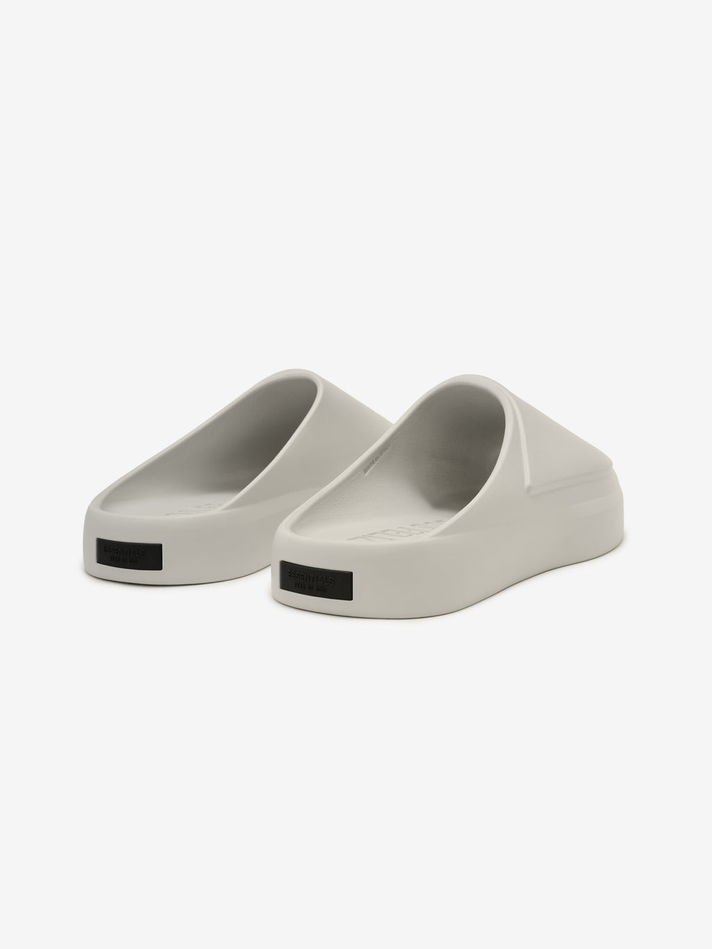 Essentials Los Feliz footwear in a soft oyster tone with a clean, molded design featuring a smooth, streamlined silhouette for minimal and comfortable casual wear.