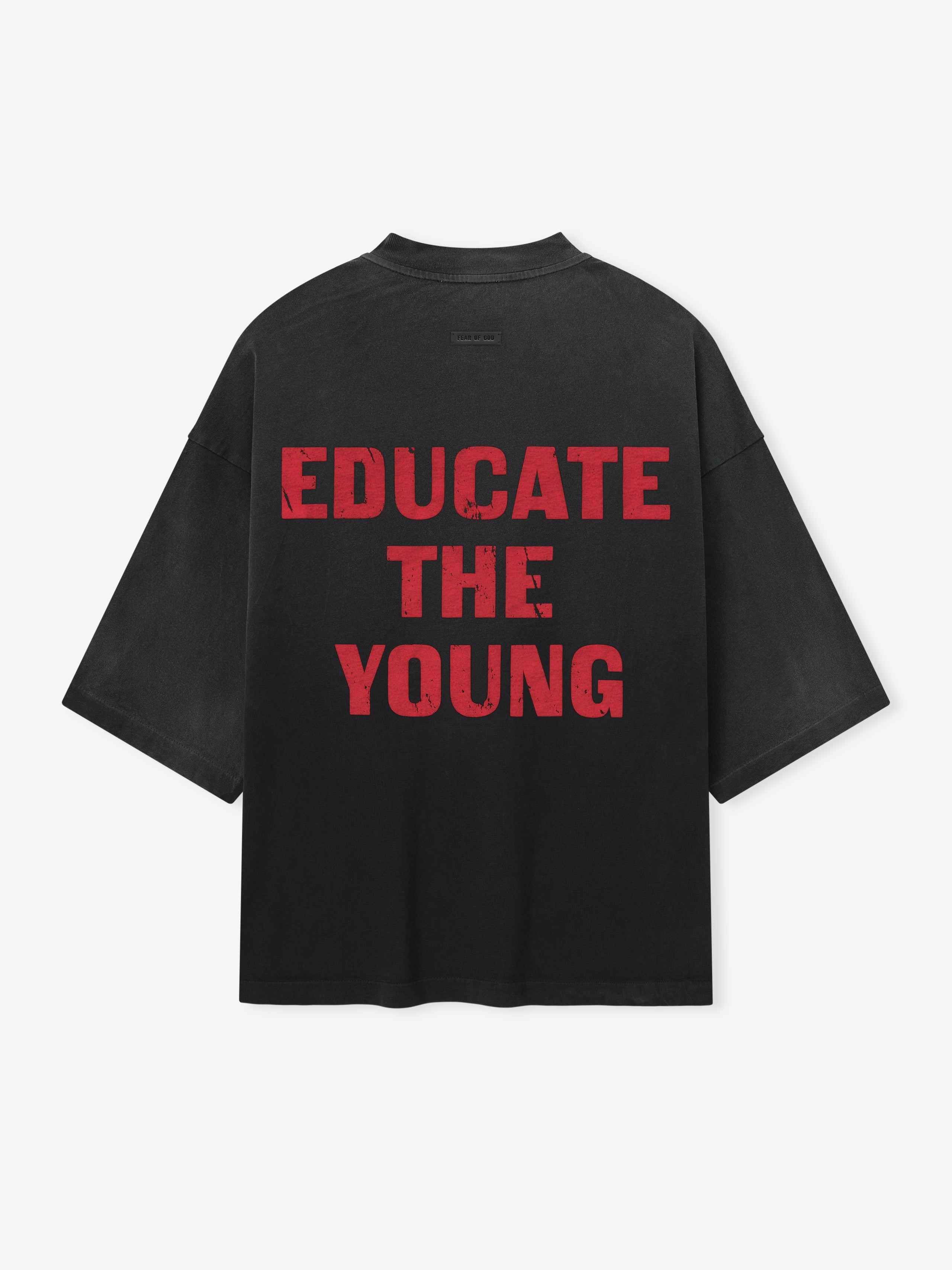 Relaxed FU Educate Tee in black featuring bold red Educate The Young text on the back, designed with an oversized fit and dropped shoulders for a modern casual tops style.