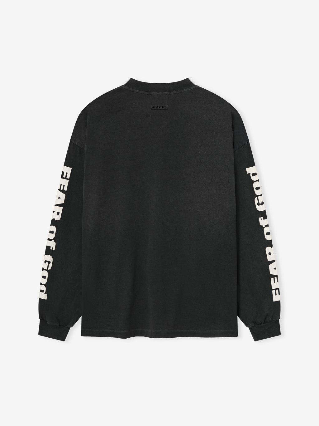 Relaxed Fear Of God Long Sleeve Tee in black featuring bold cream “FEAR OF GOD” text running down both sleeves, crafted from soft cotton for a comfortable, stylish tops option.