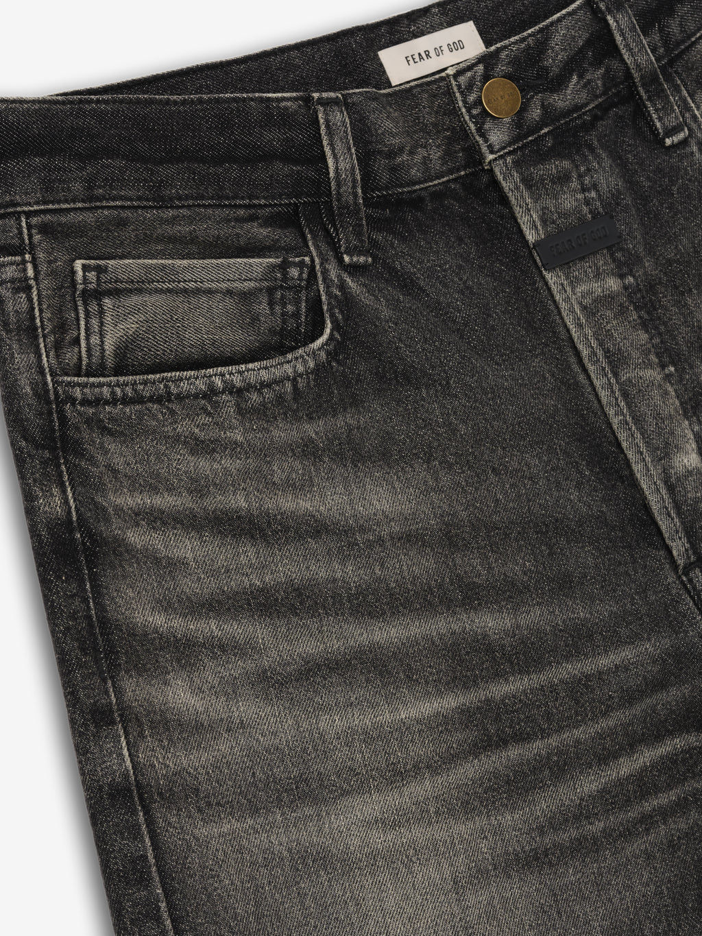 Straight 5 Pocket Jean in a faded black wash featuring subtle whiskering, tonal stitching, and a classic coin pocket detail for a modern yet timeless denim bottom.