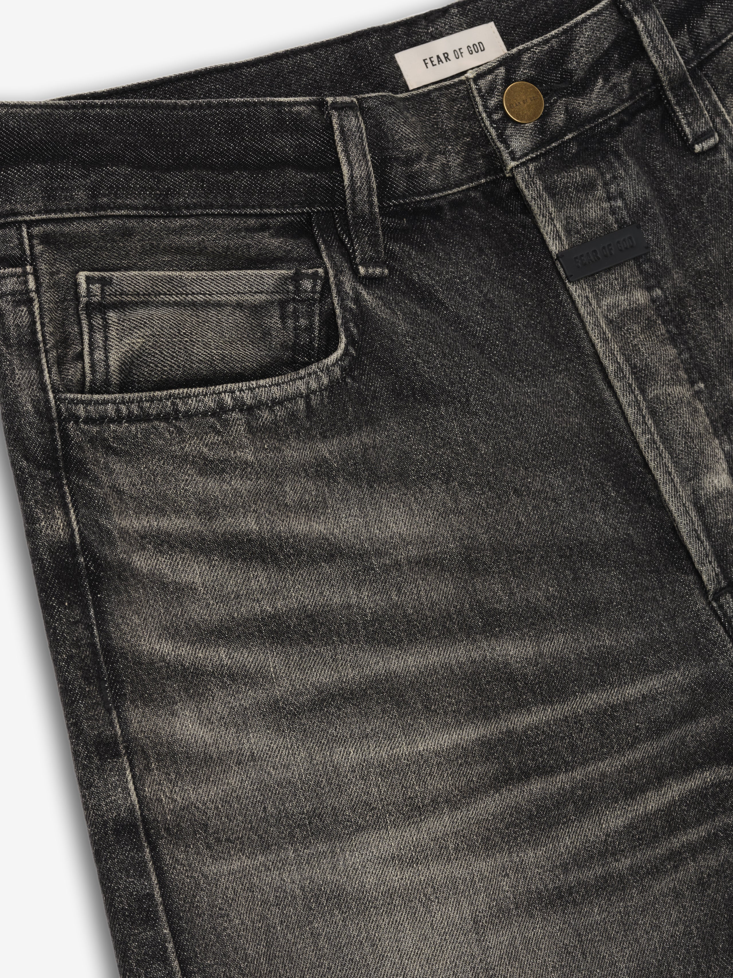 Straight 5 Pocket Jean in a faded black wash featuring subtle whiskering, tonal stitching, and a classic coin pocket detail for a modern yet timeless denim bottom.