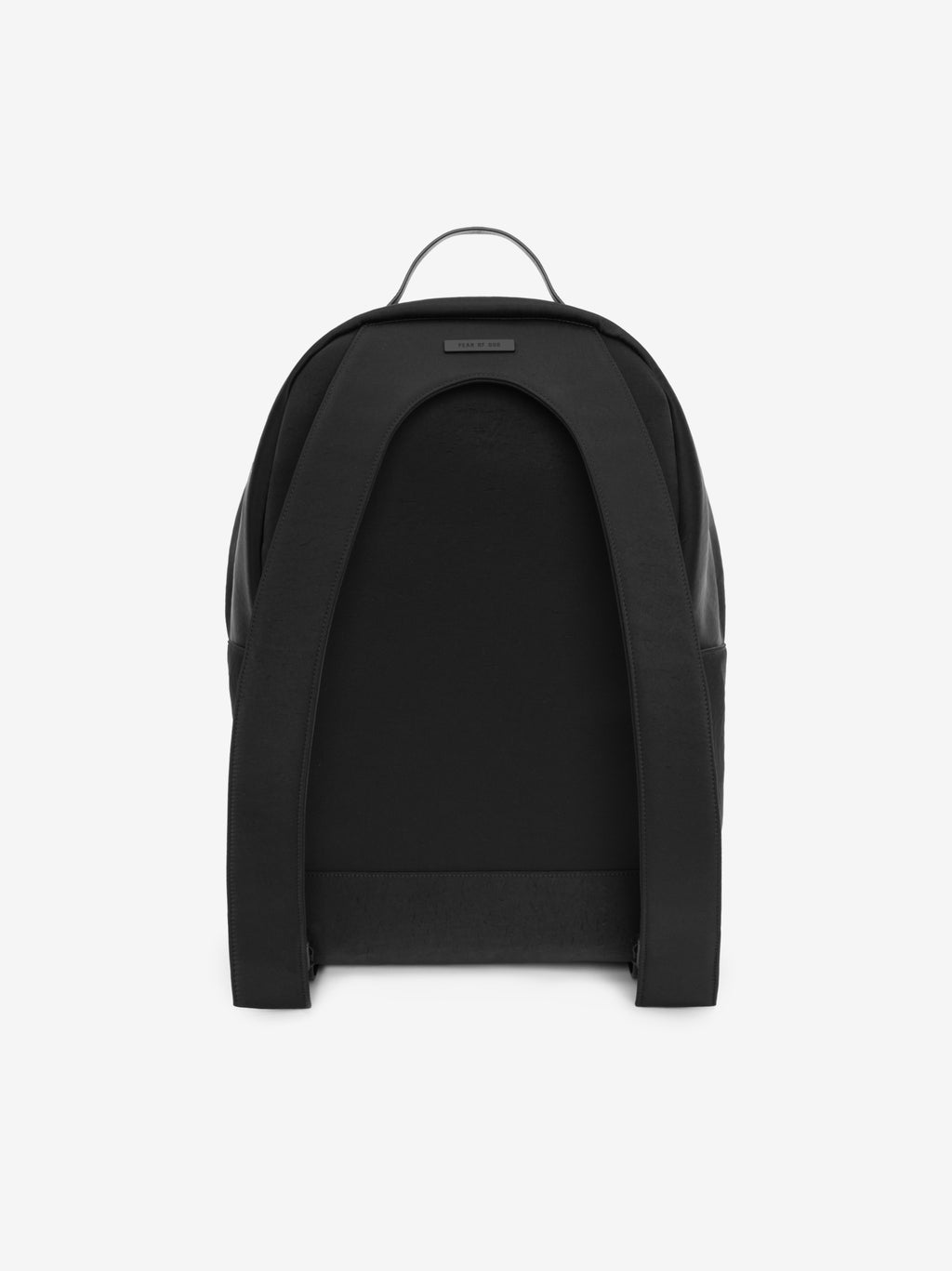 rear view of black technical nylon backpack with padded straps and leather top handle against white background