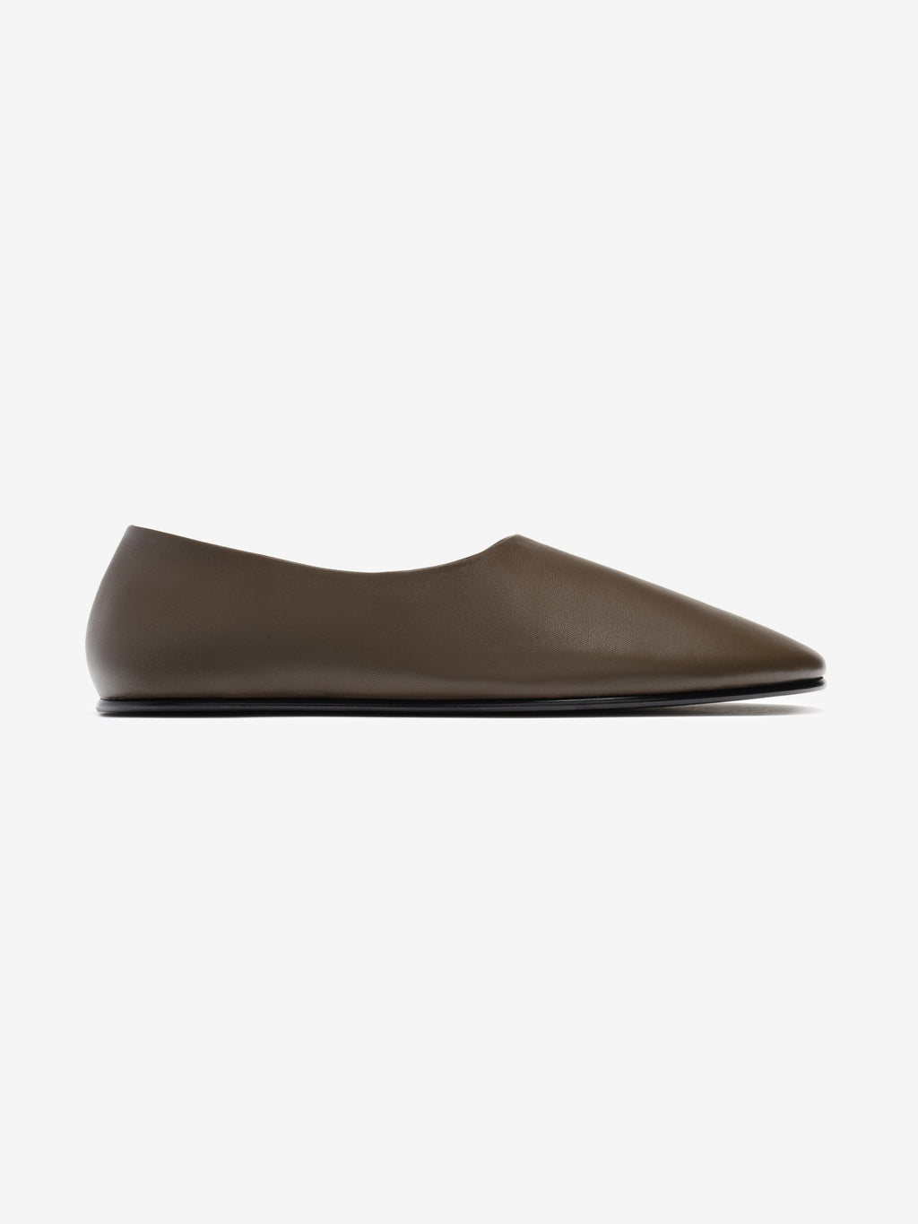 Side view of a minimalist brown leather pointed-toe flat shoe with a smooth finish on a white background