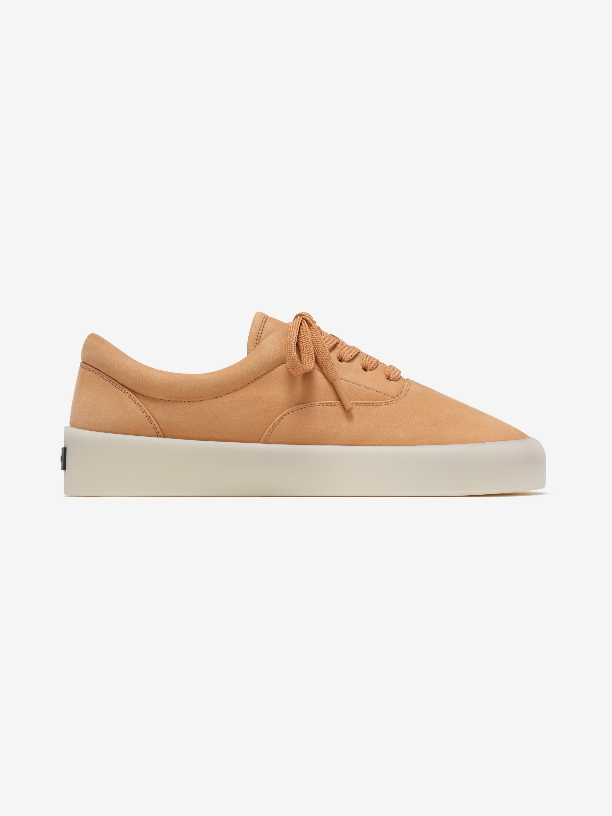 tan suede low-top sneaker with smooth cream rubber sole and tonal laces side profile view