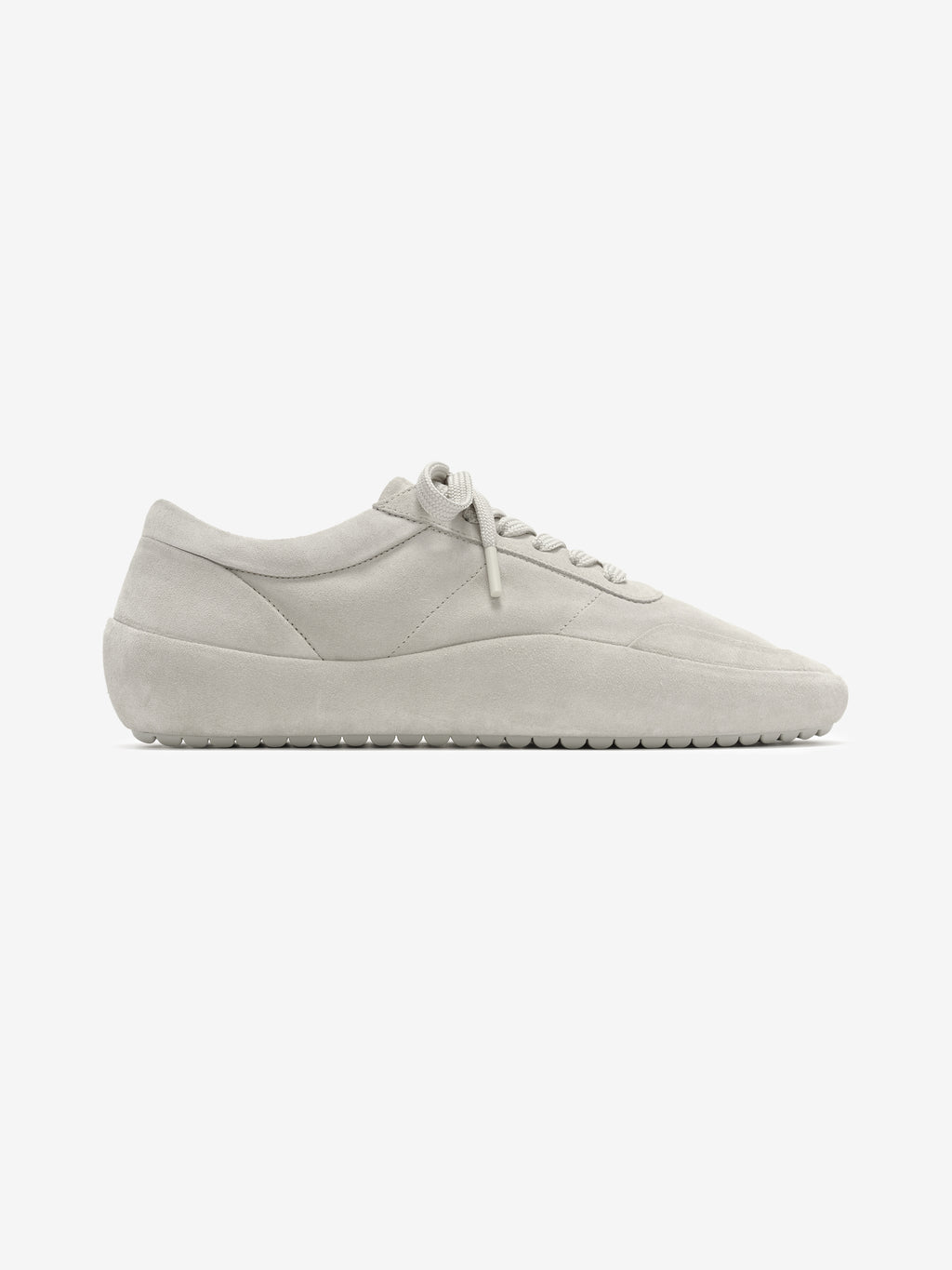 Lace Up Runner in light grey featuring a streamlined silhouette with suede upper, tonal laces, and a cushioned sole designed for stylish everyday footwear.
