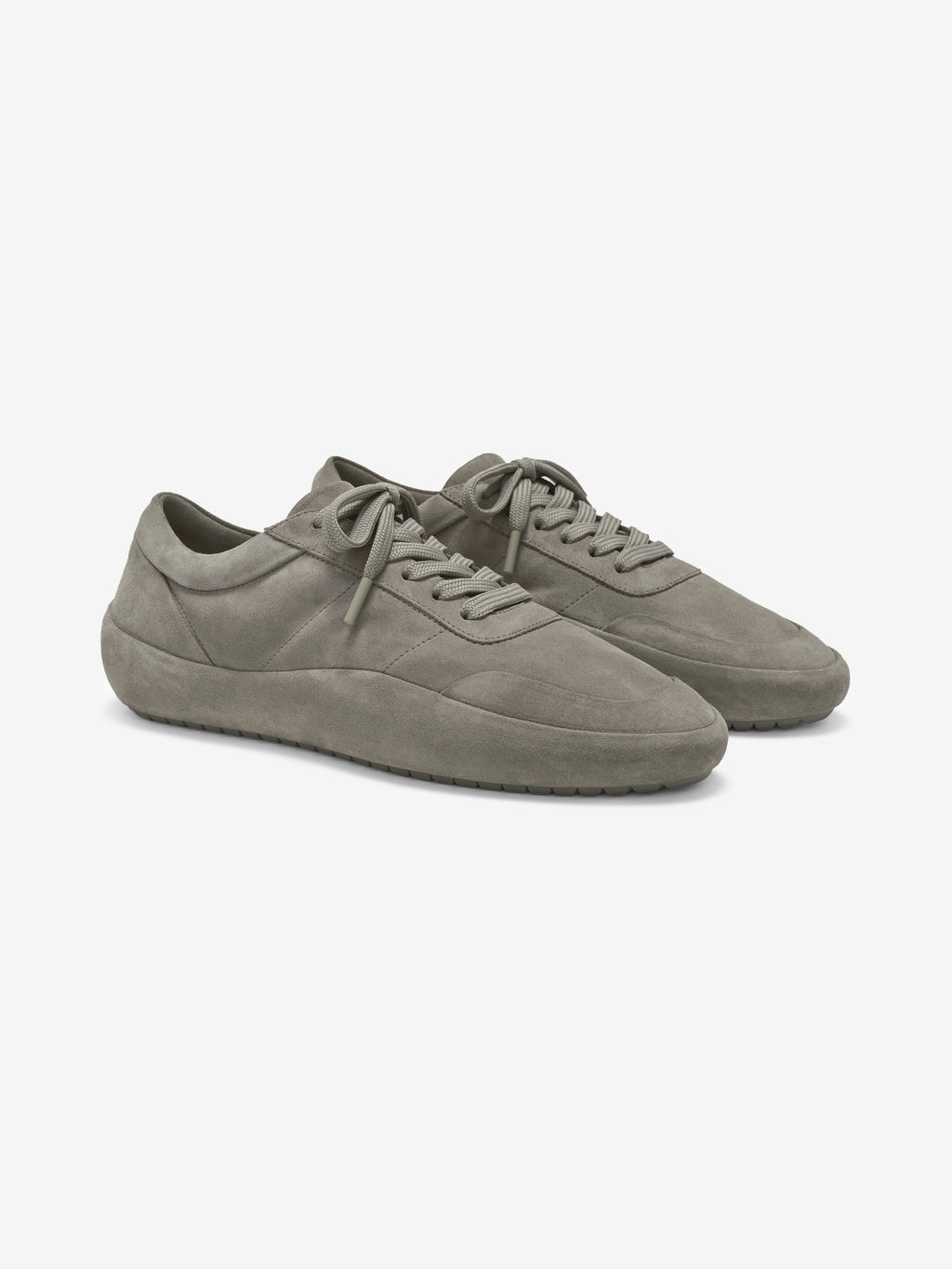 Suede Lace Up Runner in a soft grey hue featuring a refined suede upper with subtle paneling, lace closure, and a streamlined rubber sole for modern footwear style.
