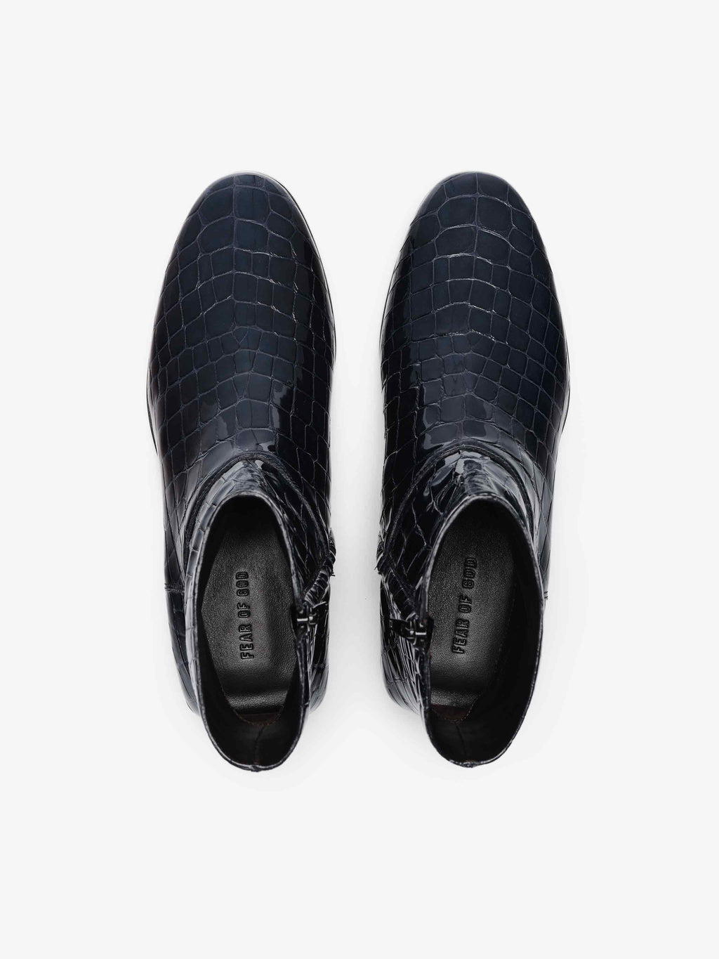 Croc Printed Ankle Boot in deep midnight blue featuring a glossy croc-embossed finish, rounded toe, side zipper closure, and low stacked heel for refined and stylish footwear.