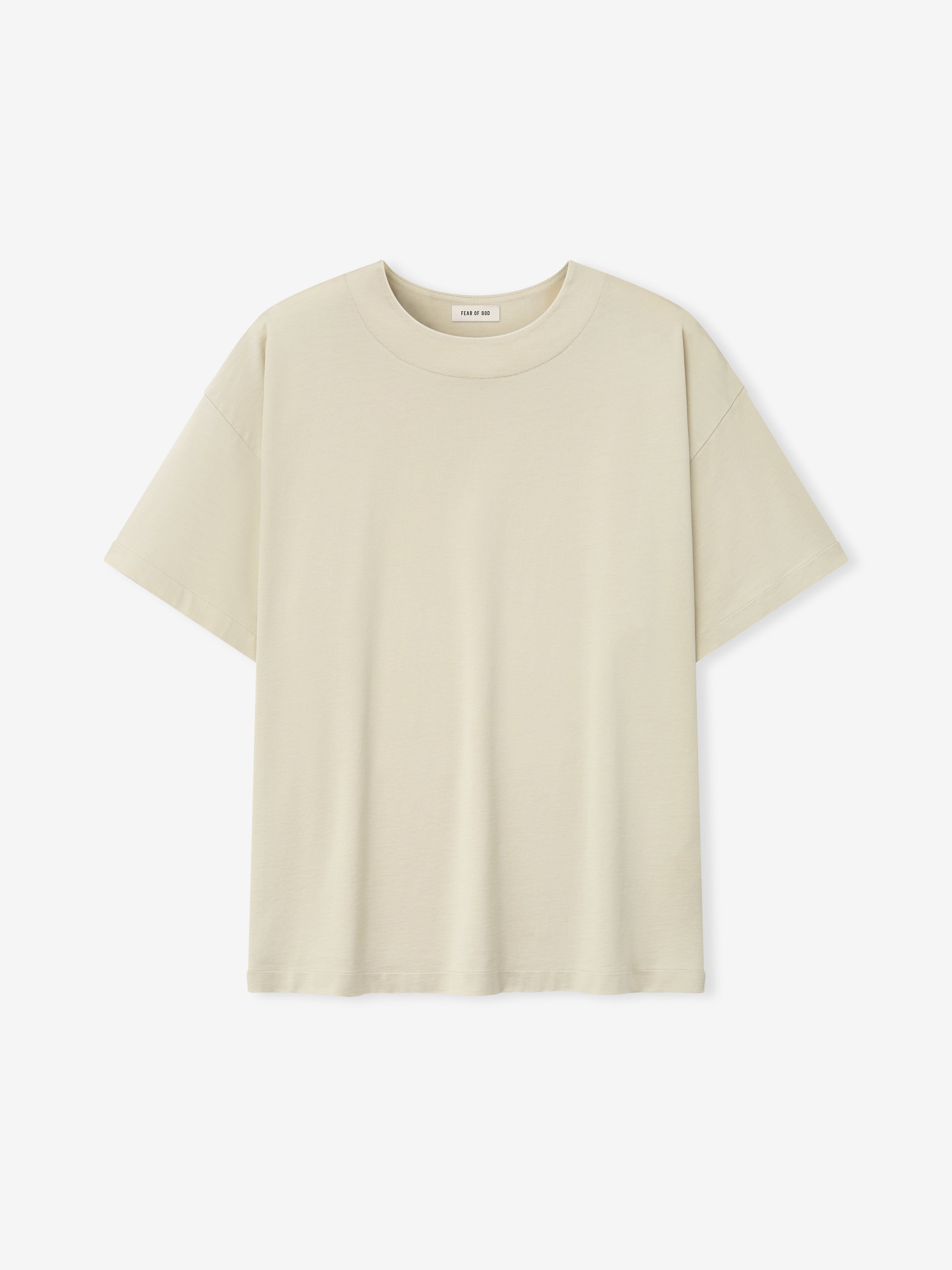 off-white cotton-rayon crew neck tee with relaxed fit and subtle stone-washed garment finish displayed flat
