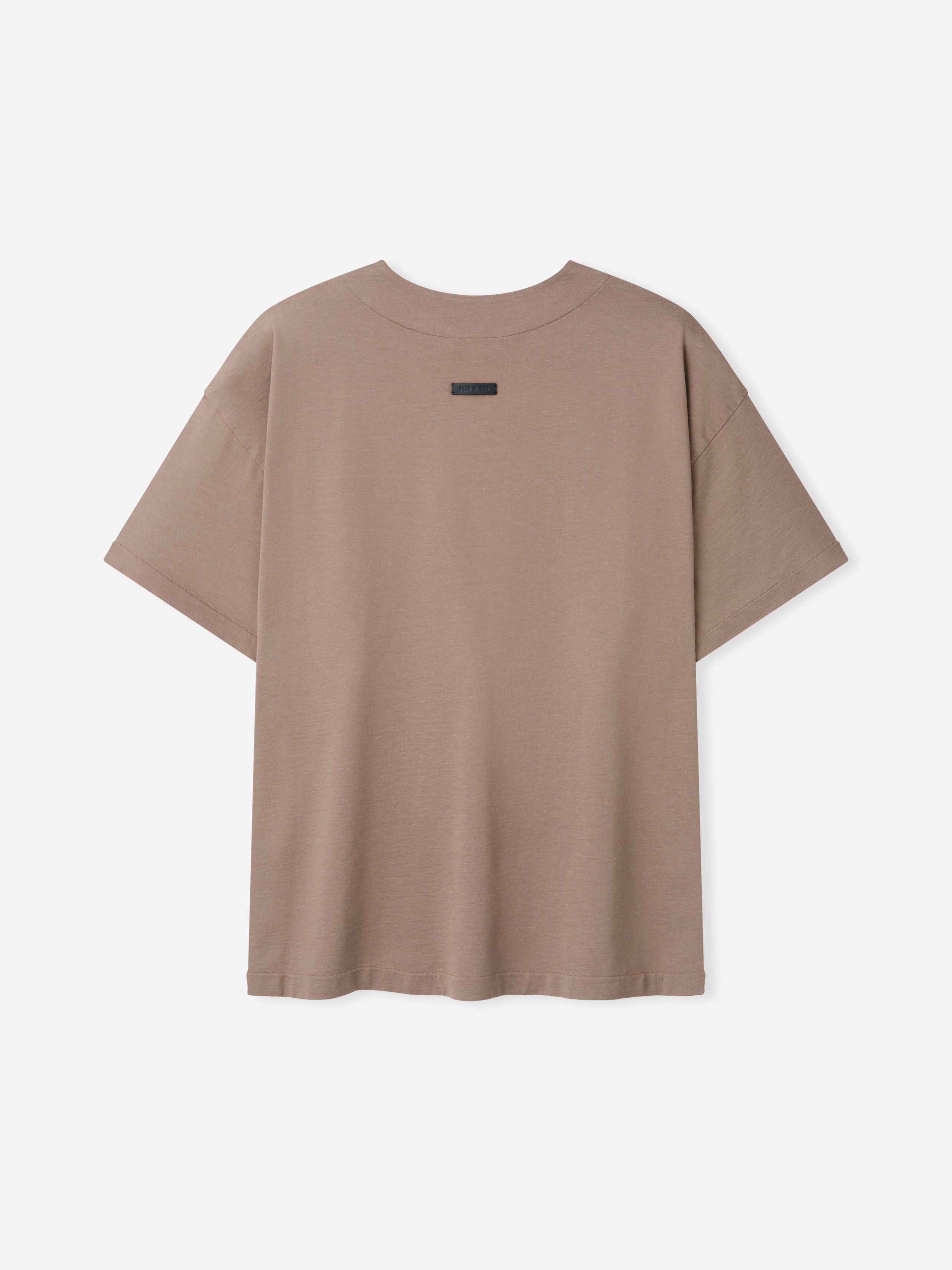 Back view of a plain short-sleeve t-shirt in muted sandy beige with a small black label near the neckline