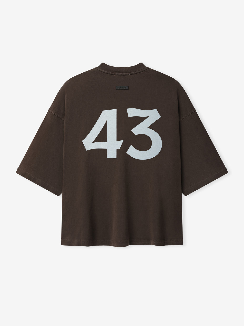 Dark brown oversized T-shirt with large white number 43 printed on the back against a white background