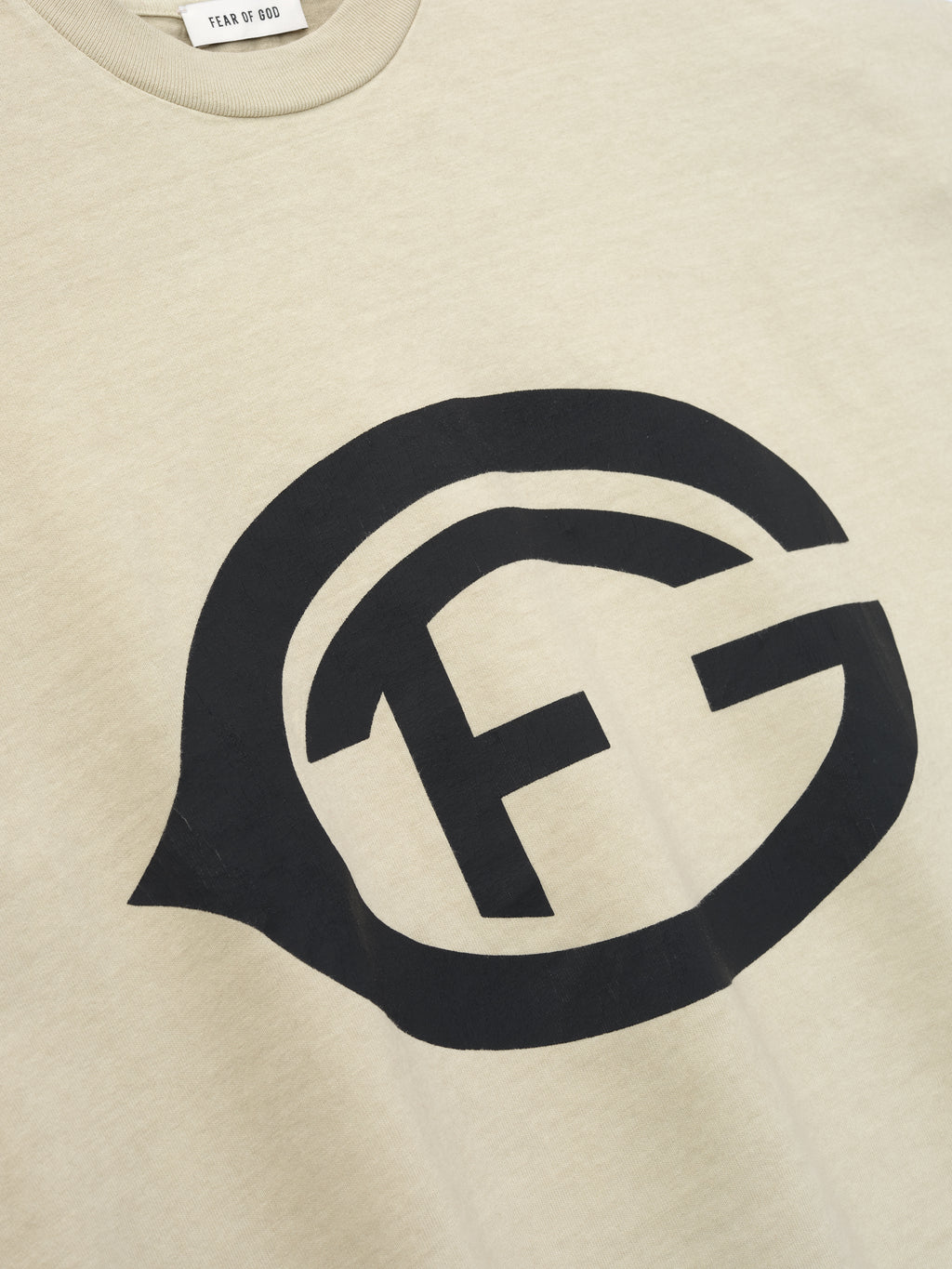 taupe heavyweight cotton jersey tee with large black stylized FG graphic printed on front chest