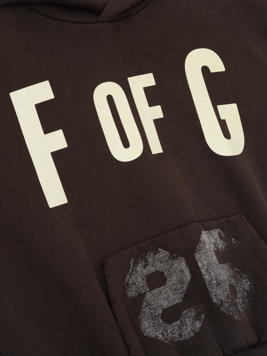 dark brown heavyweight cotton fleece hoodie with large "F OF G" print and distressed "26" graphic on front pocket