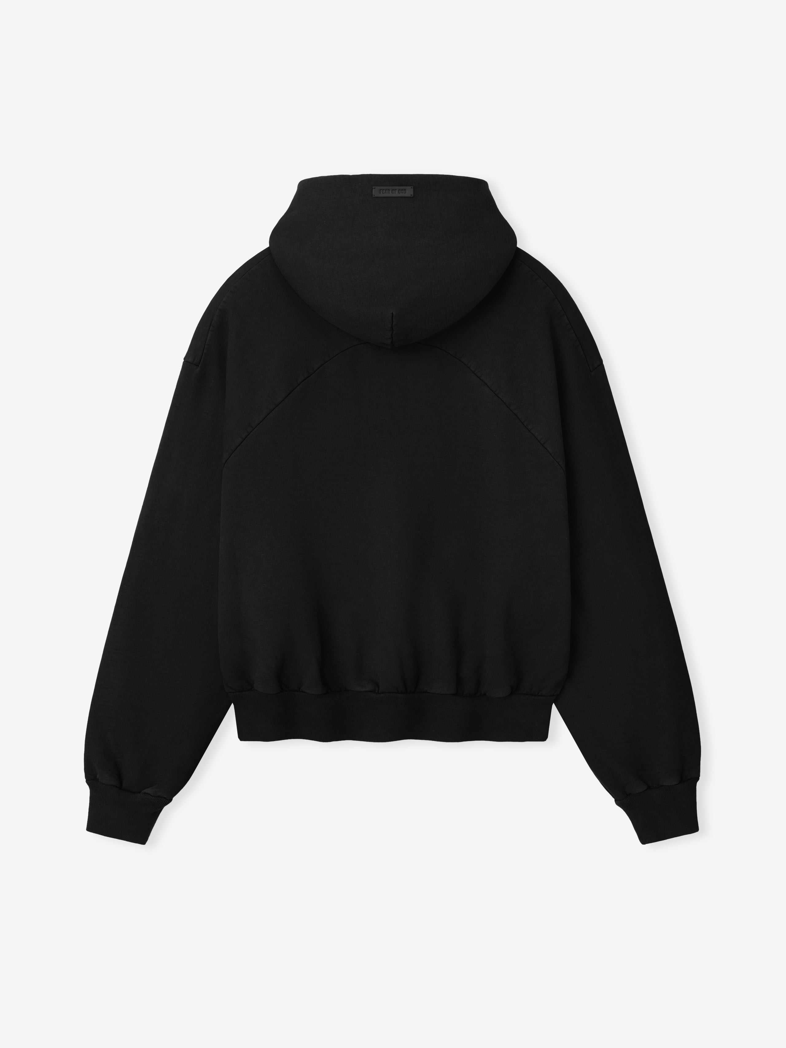 black heavyweight cotton fleece hoodie with half raglan sleeves, attached hood, and ribbed cuffs and hem back view
