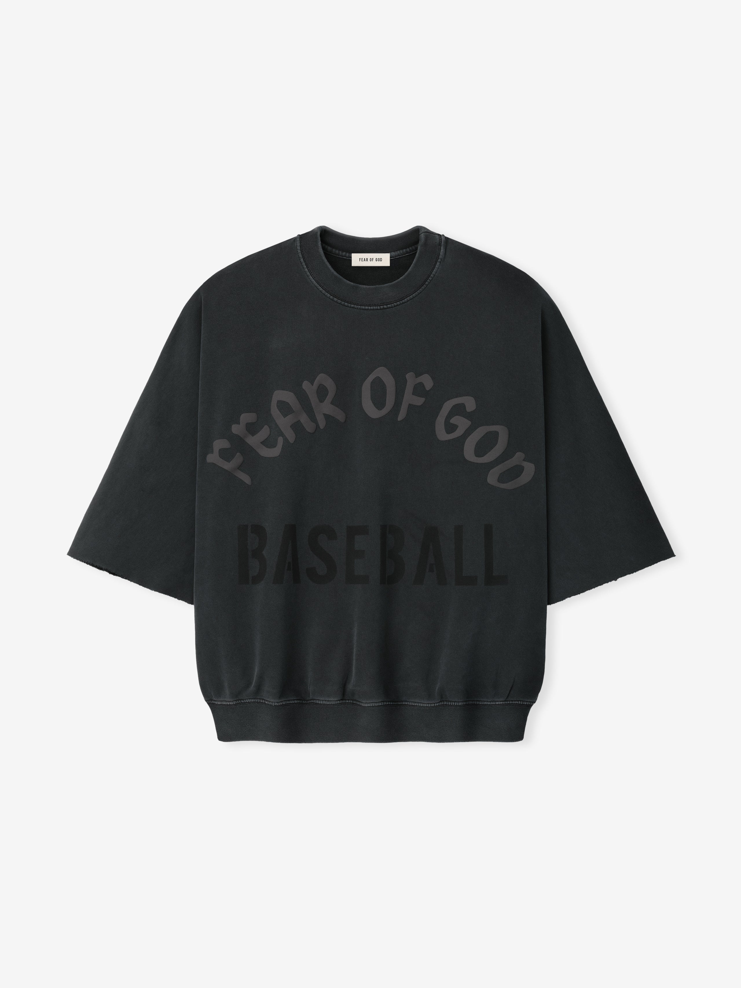 Black oversized sweatshirt with curved "Fear of God" text and "Baseball" printed below on front fabric