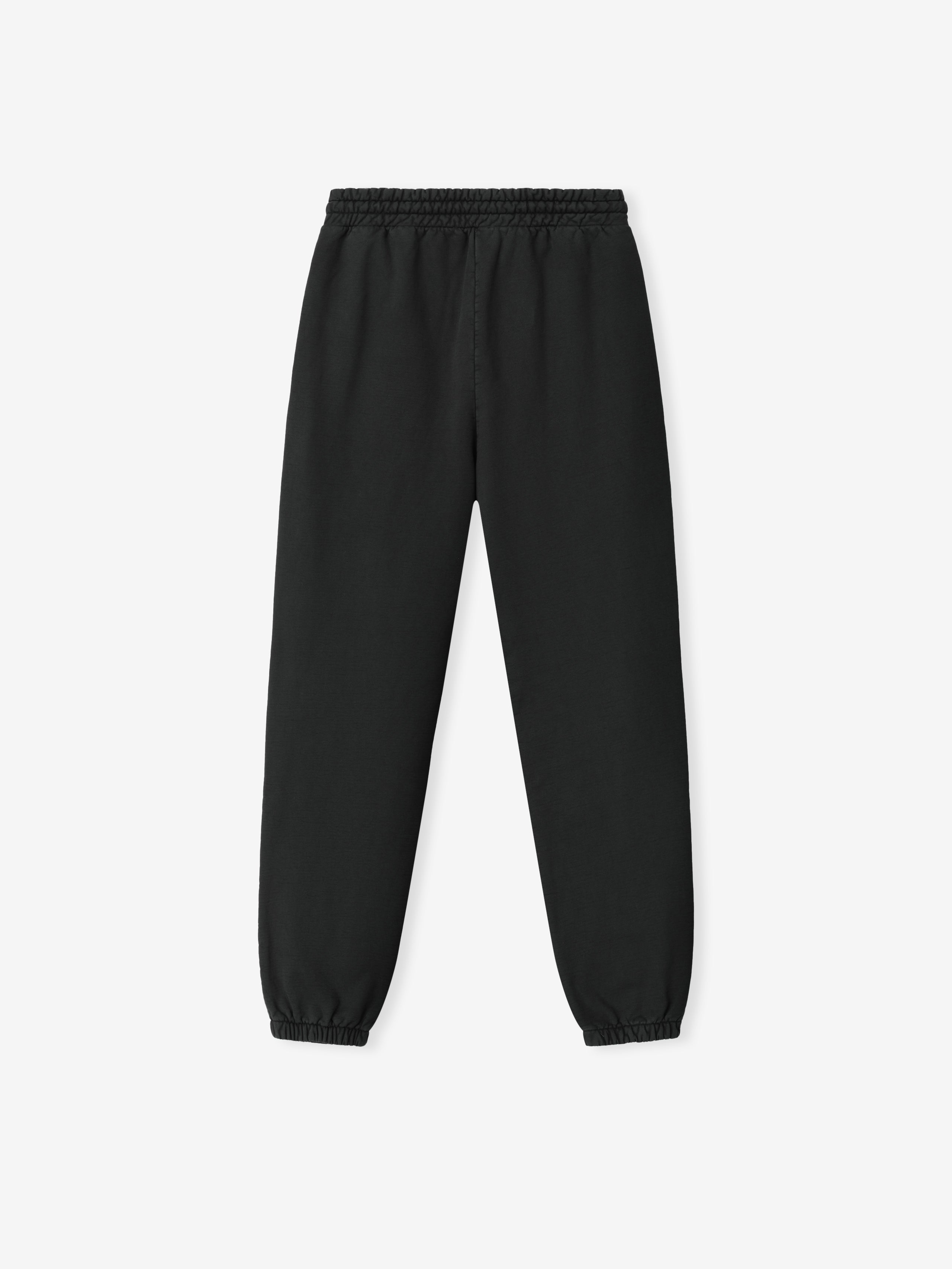 black heavyweight cotton fleece sweatpants with elastic waistband and ankle cuffs in a classic relaxed fit