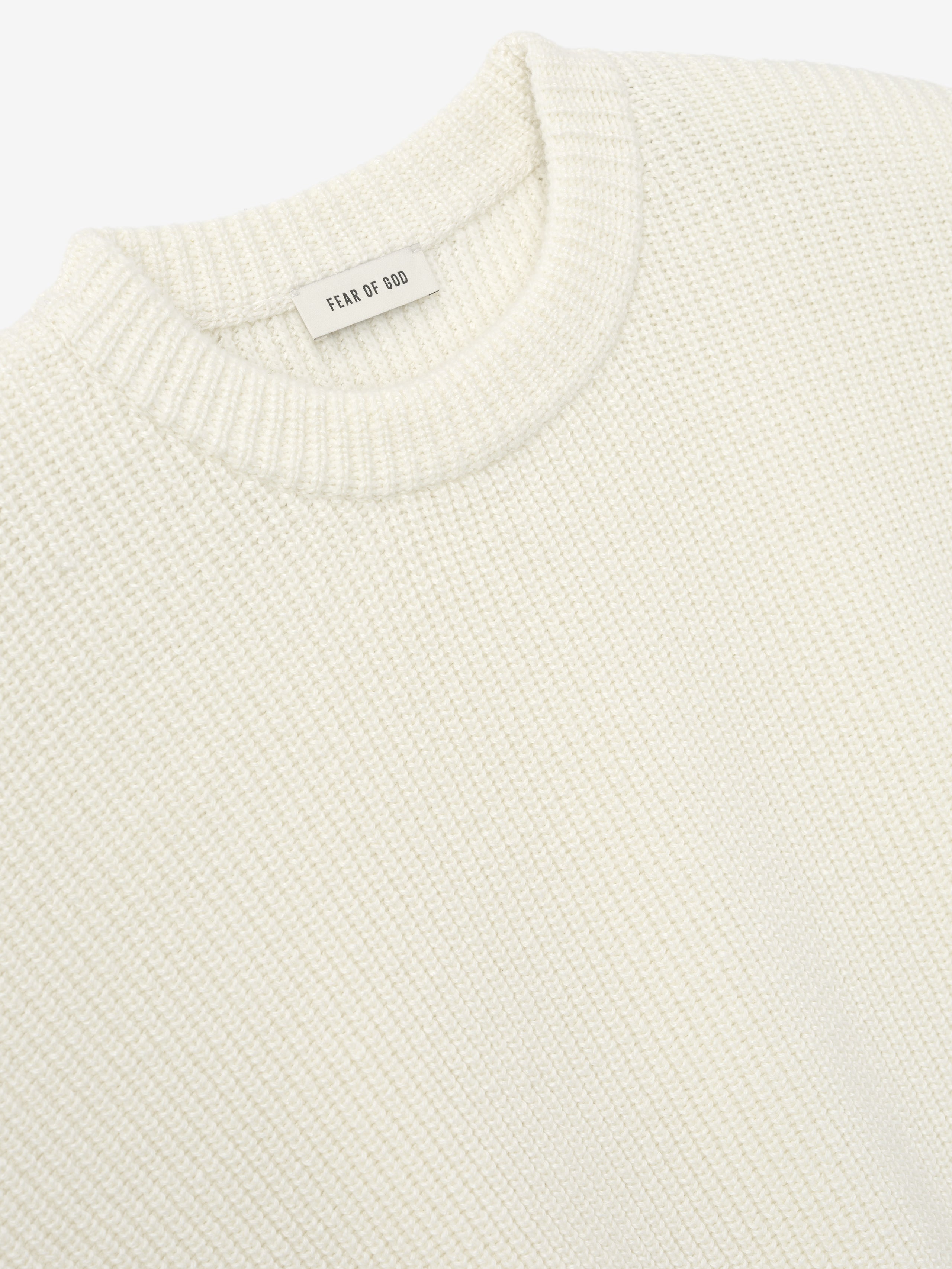 close-up of off-white crewneck sweater with double-knit linen wool cotton blend and ribbed collar detailing