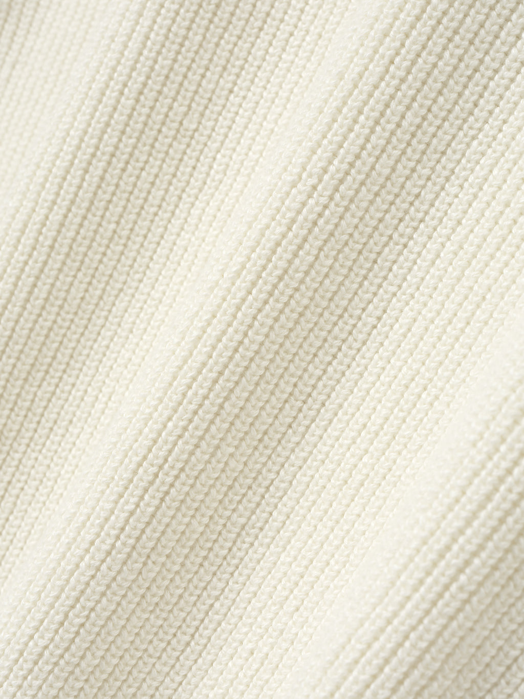 close-up of off-white double-knit fabric with ribbed texture in linen wool cotton blend for crewneck sweater