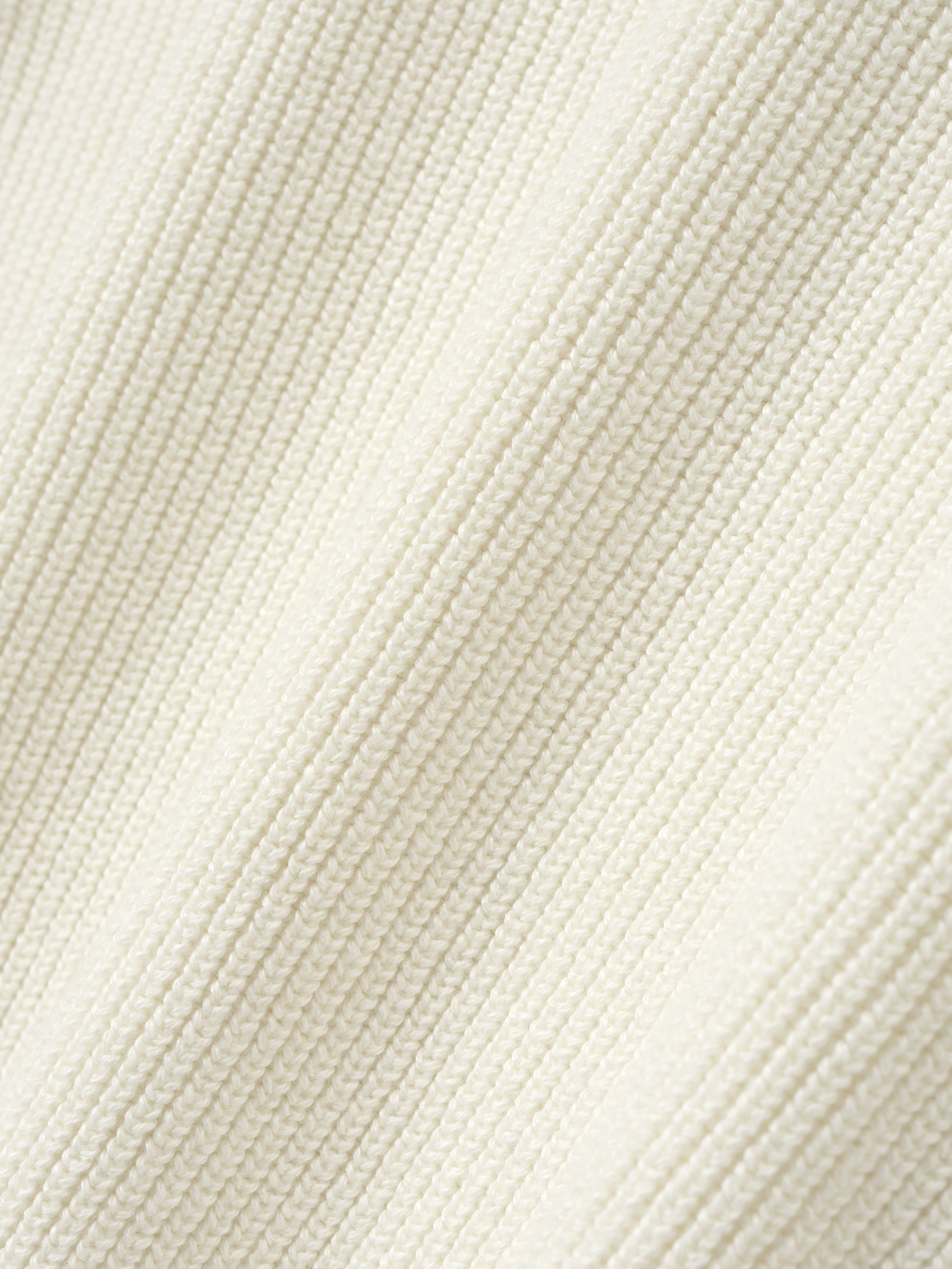 close-up of off-white double-knit fabric with ribbed texture in linen wool cotton blend for crewneck sweater