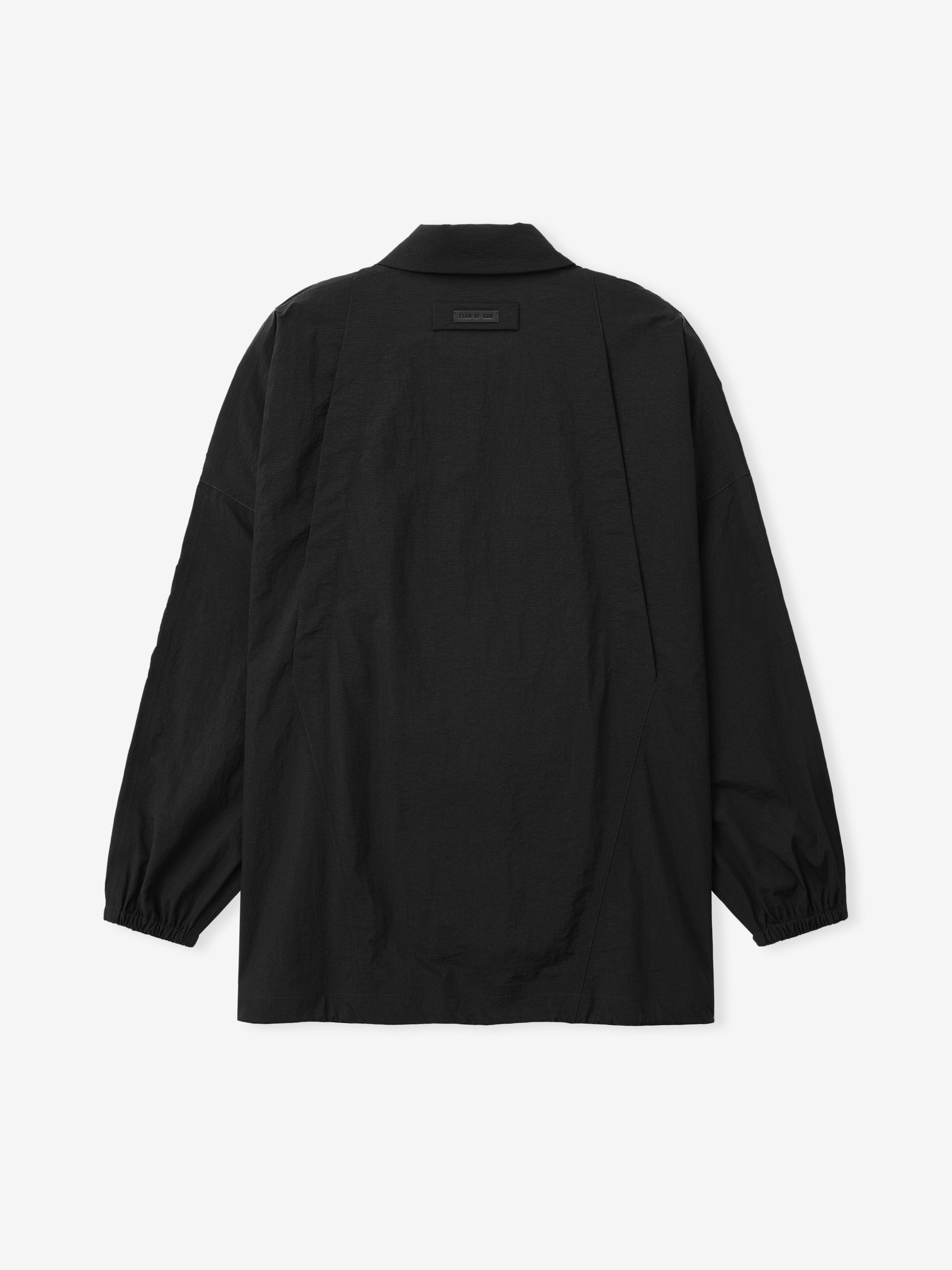 black lightweight nylon ripstop tech windbreaker jacket with long sleeves and elastic cuffs shown from back view