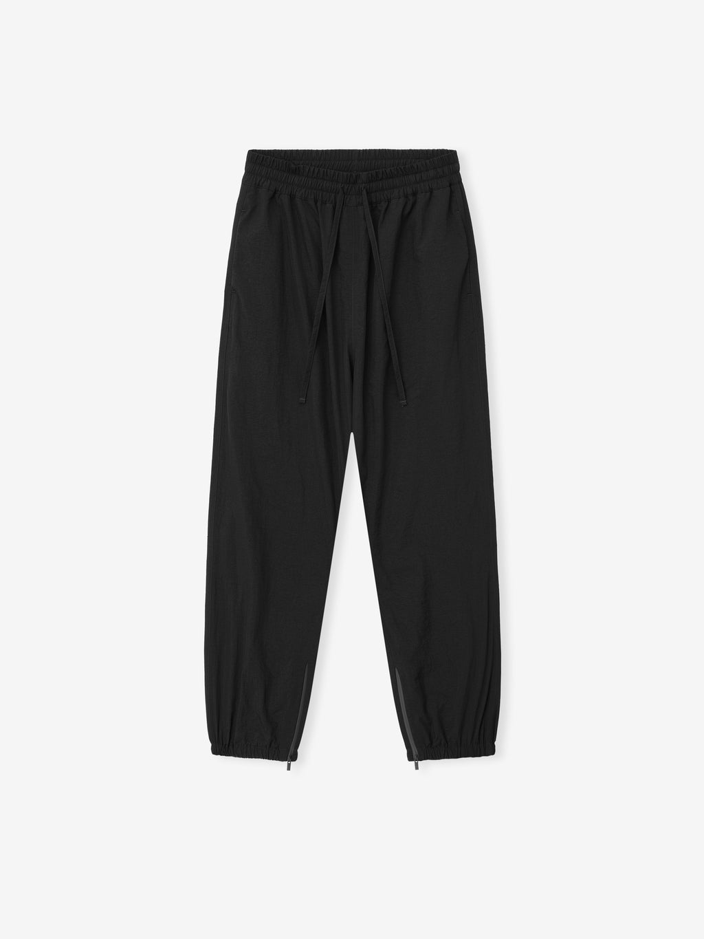 black recycled nylon ripstop tech track pants with elastic waistband, drawstrings, zippered leg cuffs, and side pockets