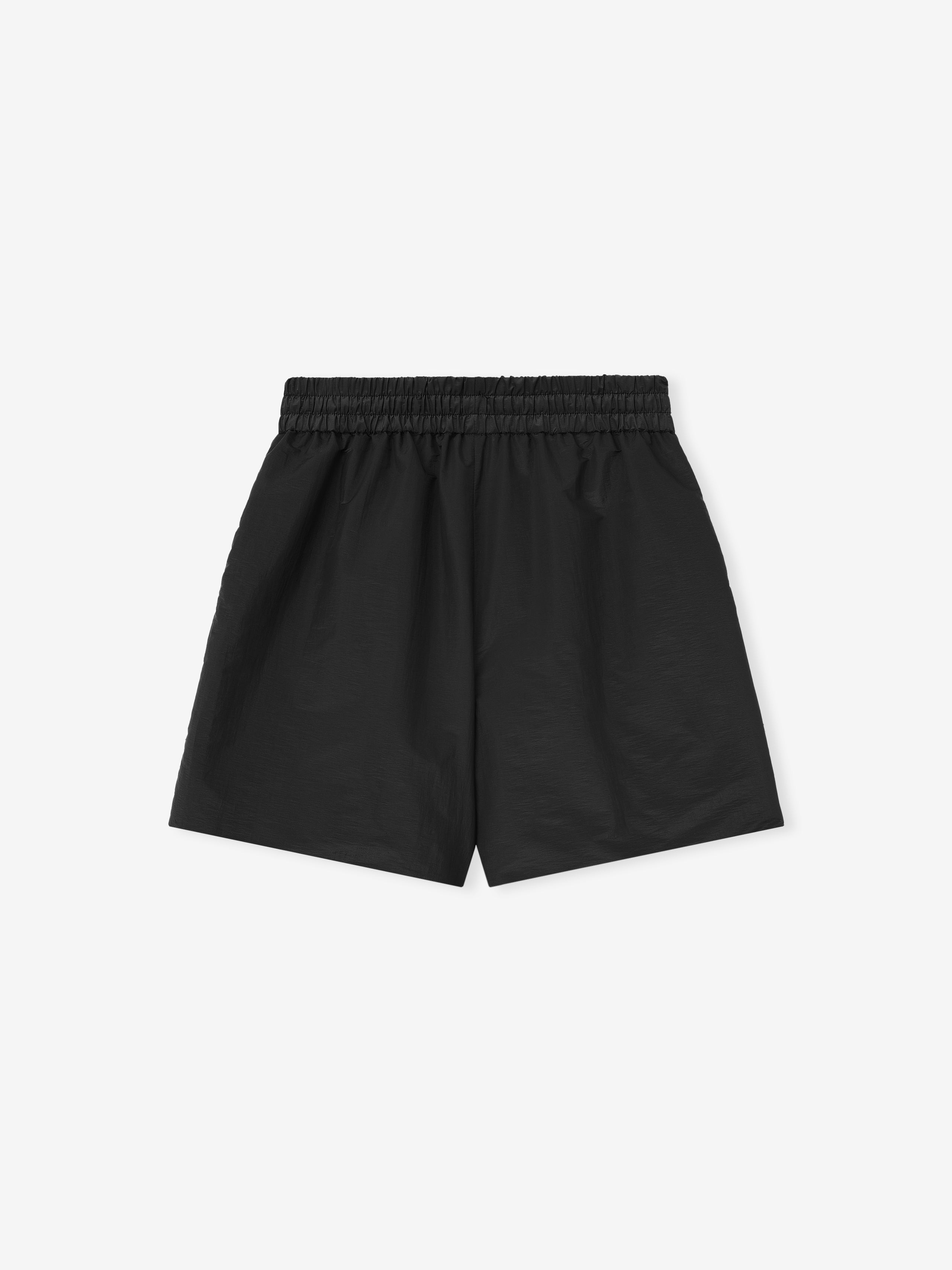 black lightweight nylon taffeta padded sport shorts with elasticated waistband and relaxed fit silhouette