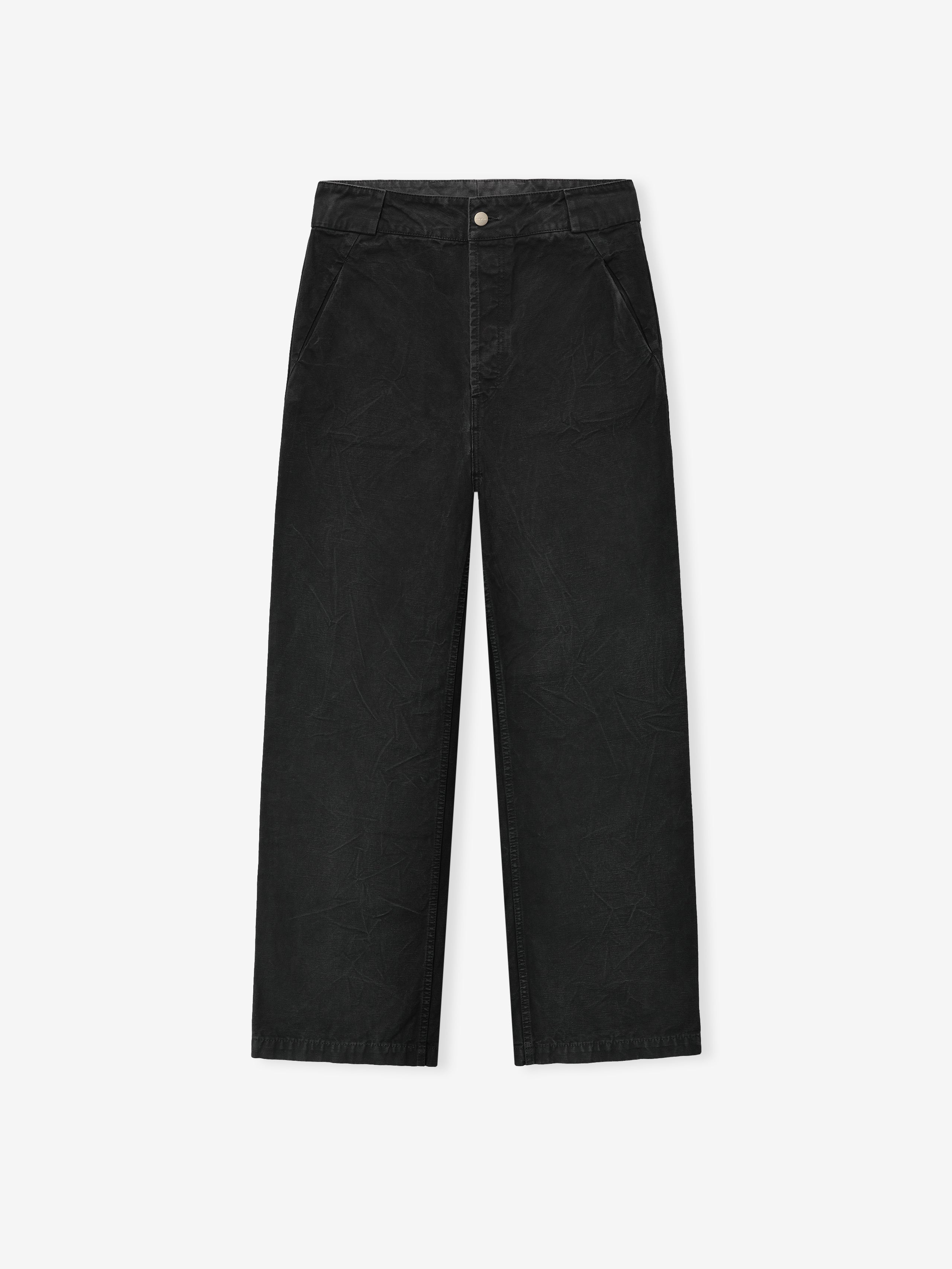 front view of relaxed fit washed black canvas utility pants with front seam pockets and metal button closure