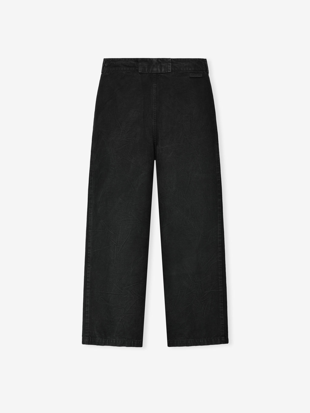back view of relaxed fit washed black canvas utility pants with wide legs and subtle seam detailing