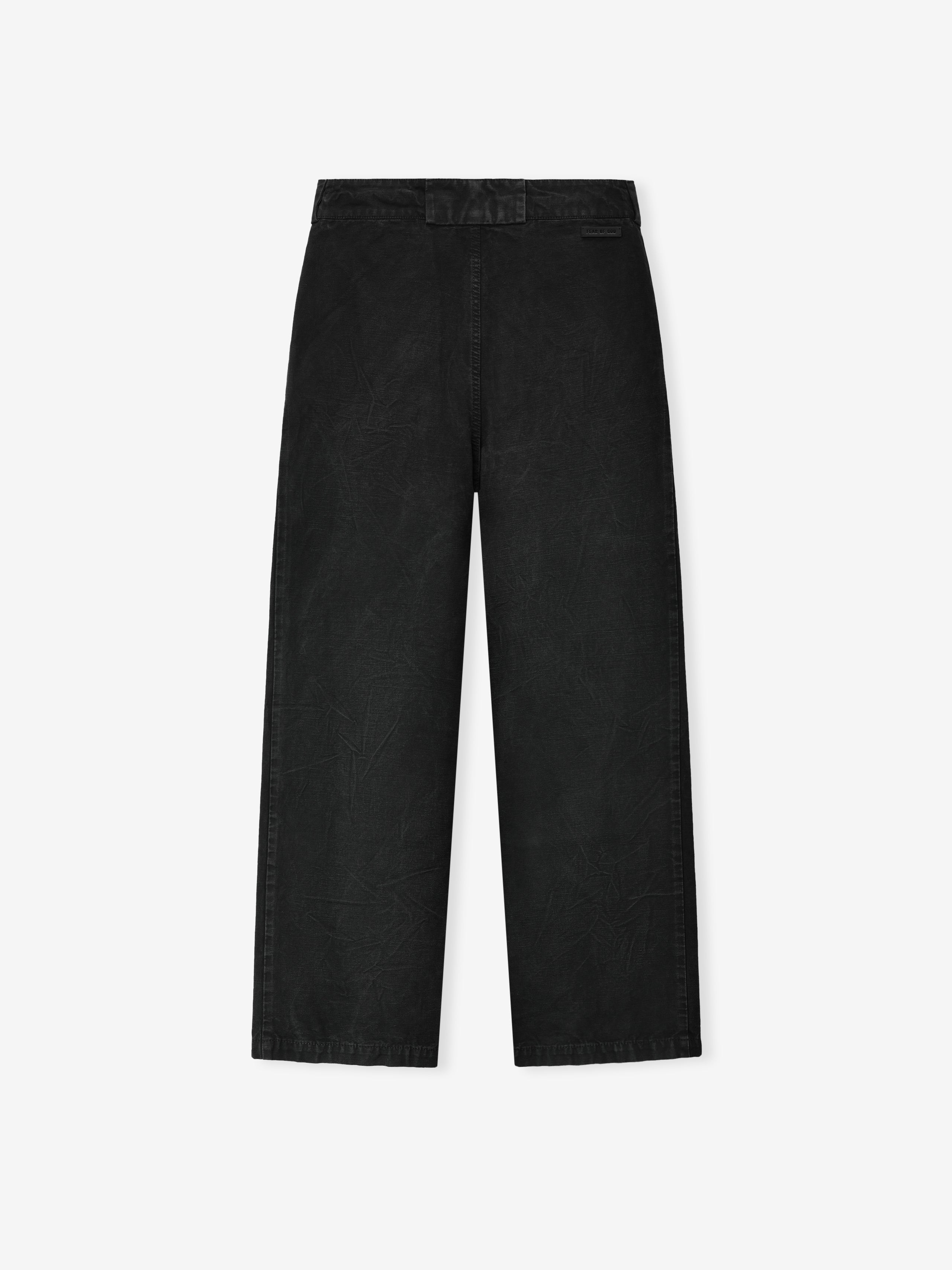 back view of relaxed fit washed black canvas utility pants with wide legs and subtle seam detailing