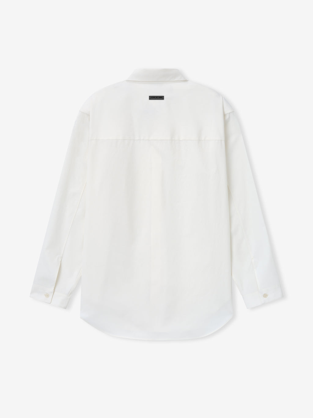 back view of white cotton wool oxford shirt with long sleeves, small button cuffs, and black label detail at collar