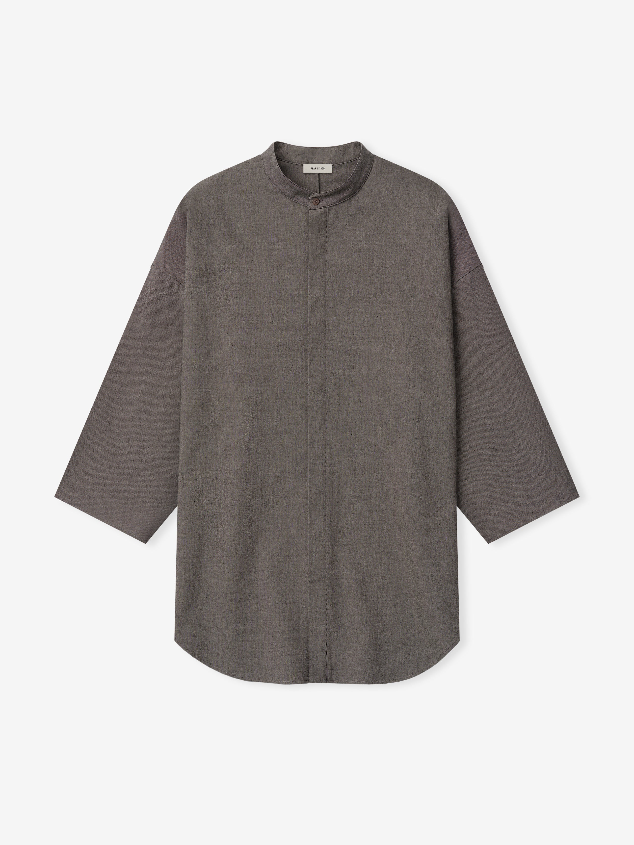 brown cotton-wool oxford shirt with mandarin collar, relaxed fit, long sleeves, and concealed button placket on white background