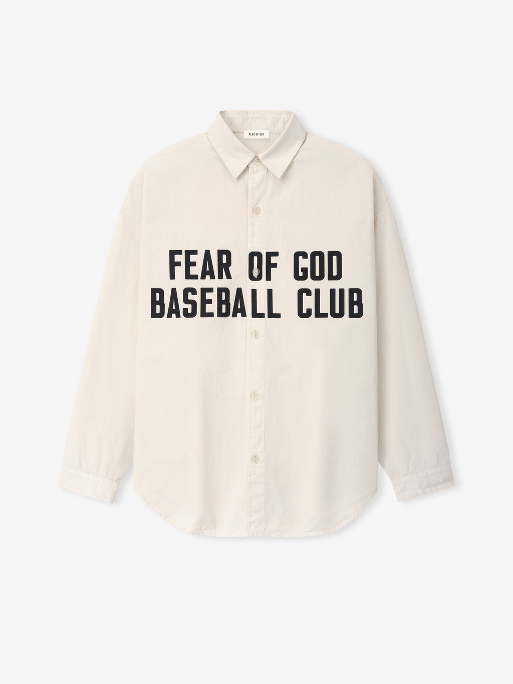 Cream-colored long-sleeve shirt with button front and bold black text print across the chest
