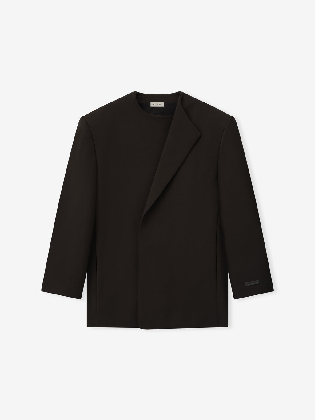 black double-weave virgin wool collarless crewneck jacket with sculptural weight and relaxed tailored silhouette