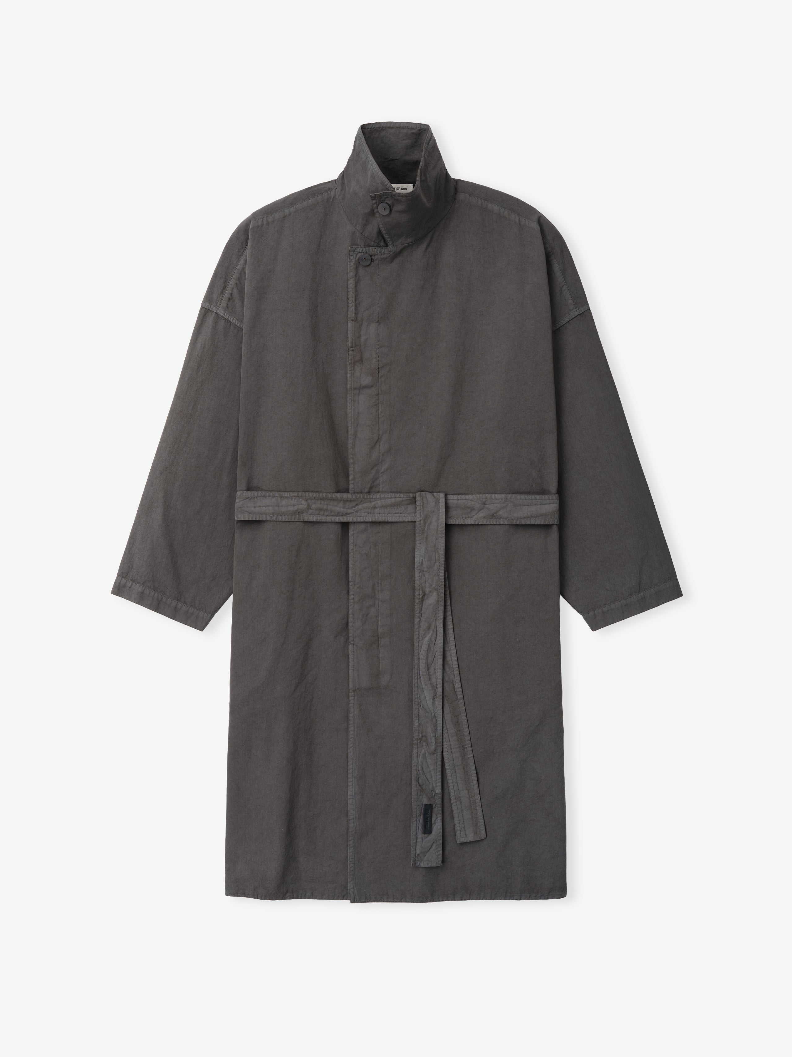 Dark gray car coat with stand collar, concealed button closure, and fabric belt laid flat on white background