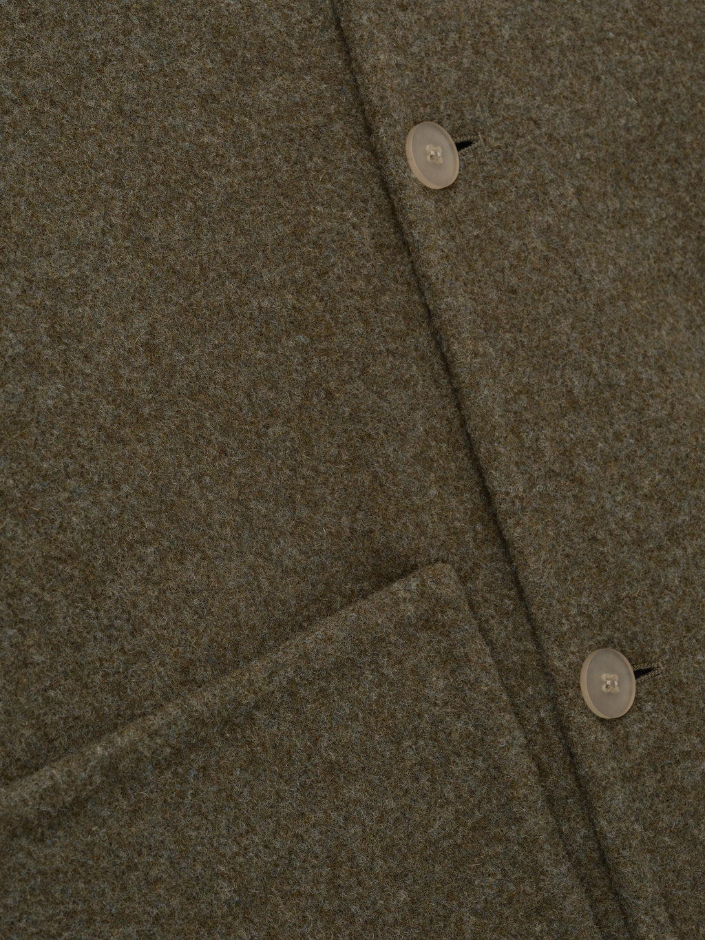 close-up of olive green double-face wool-cashmere sport jacket with button closure and front patch pocket detail