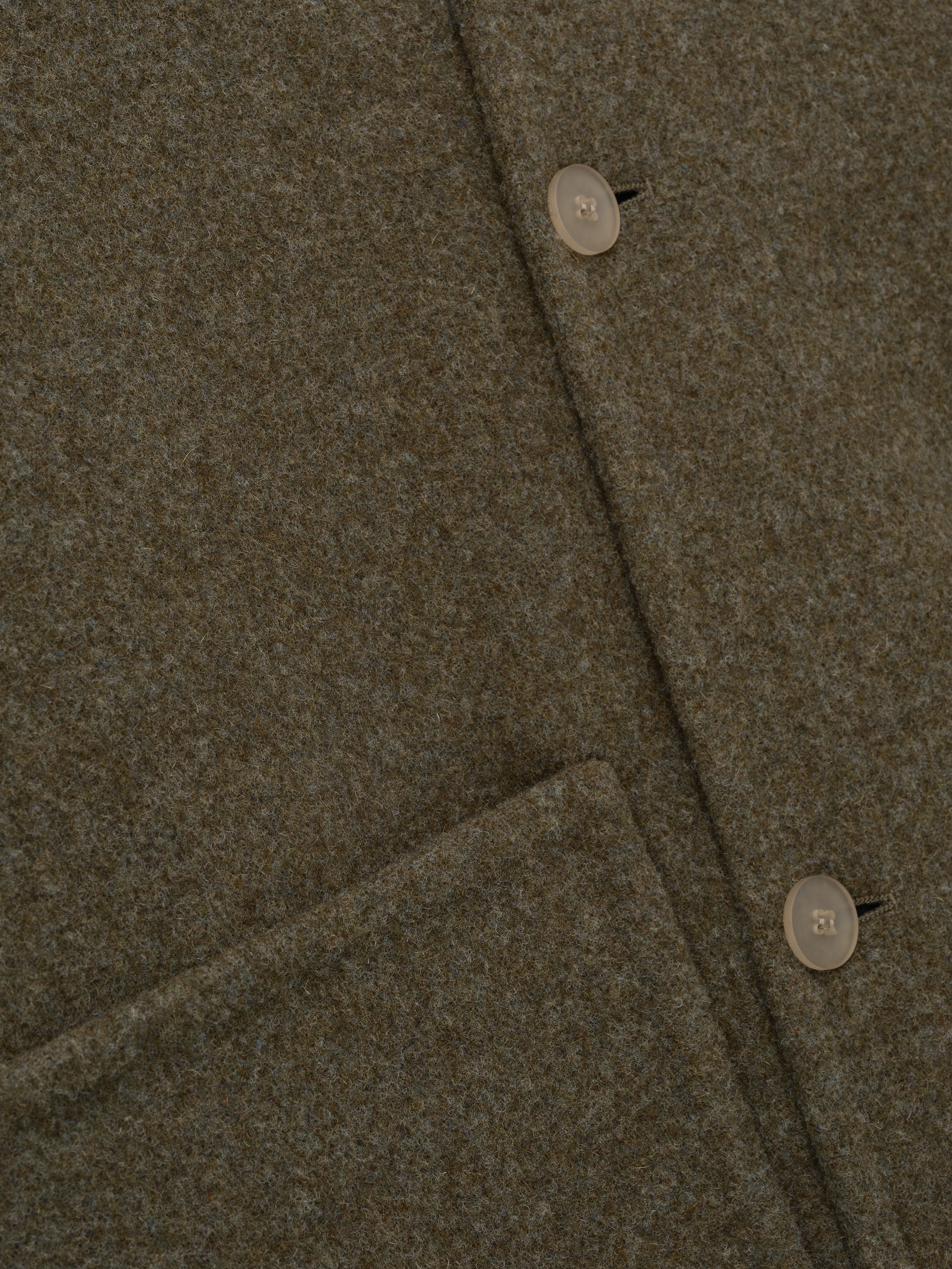 close-up of olive green double-face wool-cashmere sport jacket with button closure and front patch pocket detail