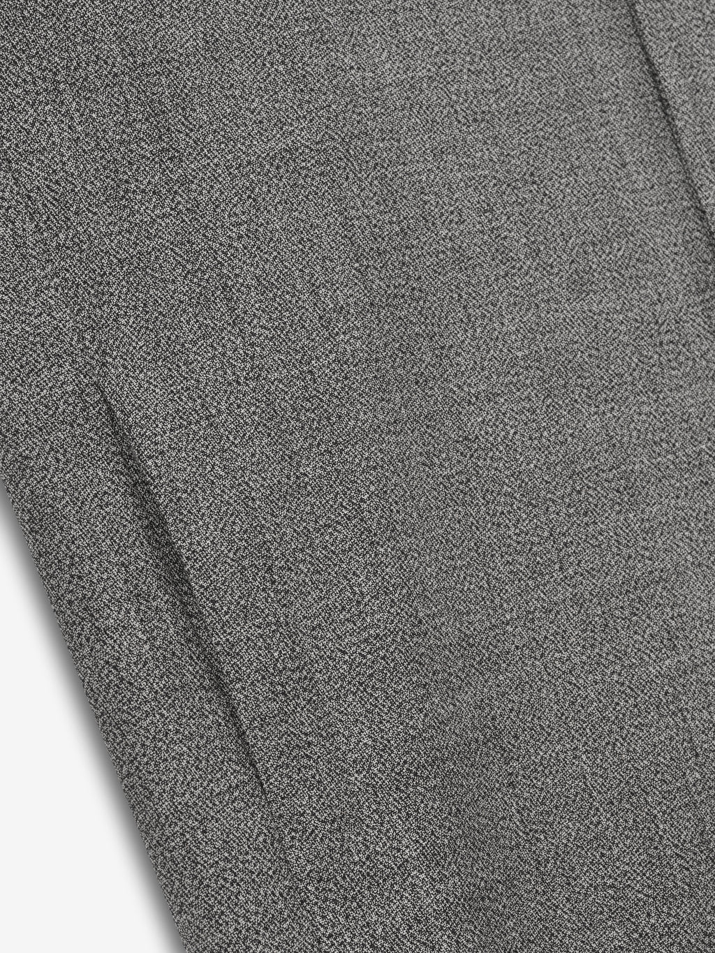 detailed close-up of gray mouline virgin wool fabric showing subtle textured weave of relaxed trench coat