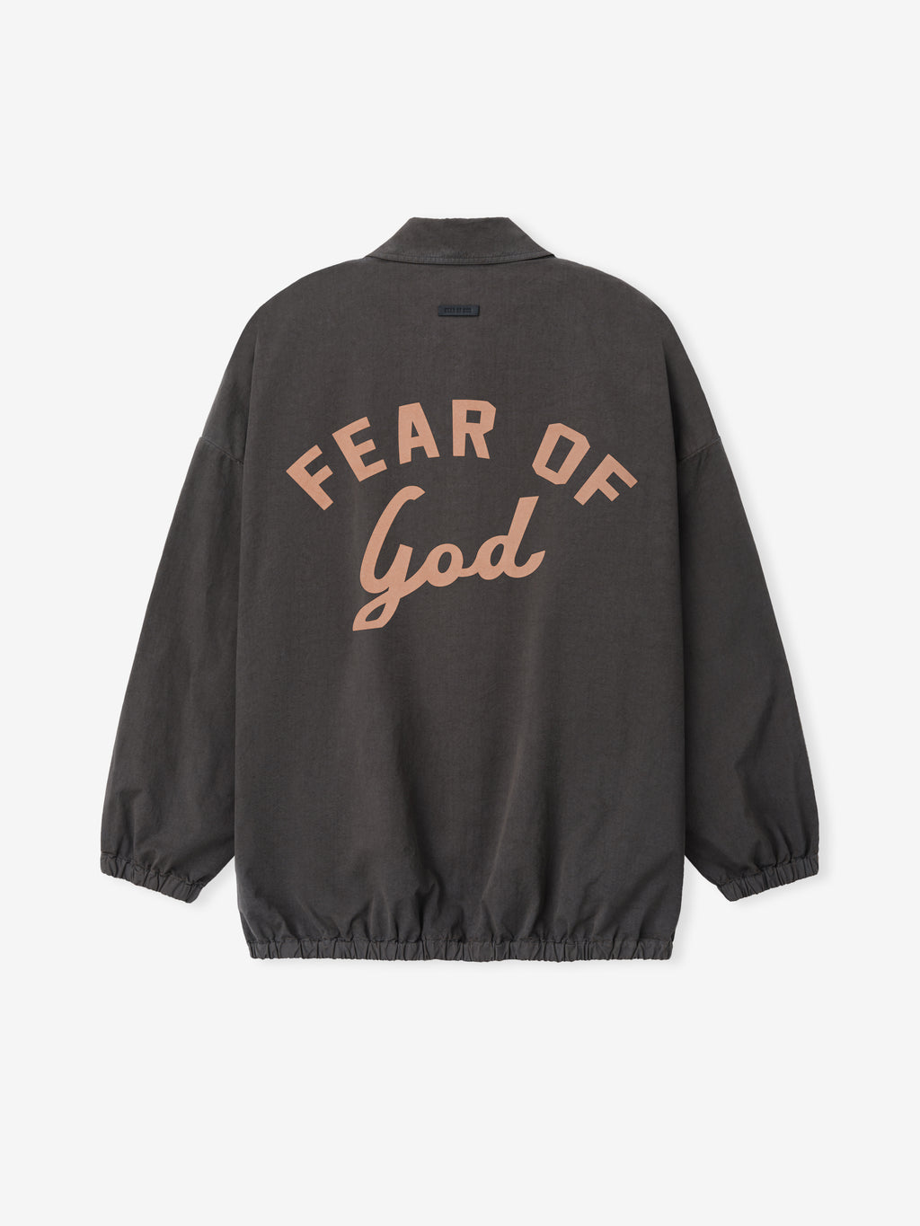 Back view of dark gray jacket with elastic cuffs and hem, spread collar, and "FEAR OF God" text in beige on back