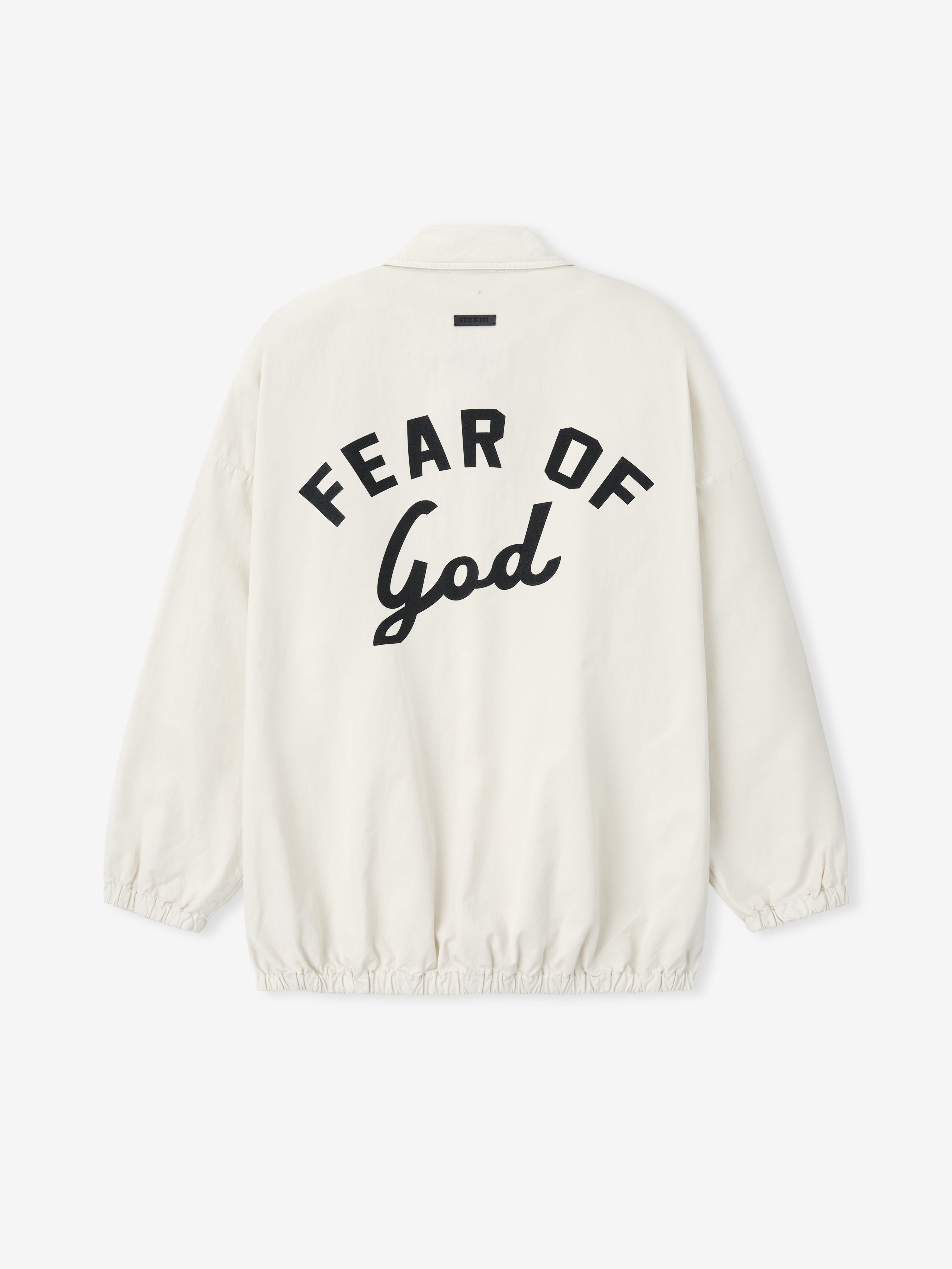 Off-white jacket with elastic hem and cuffs, spread collar, and bold "FEAR OF God" text printed on the back