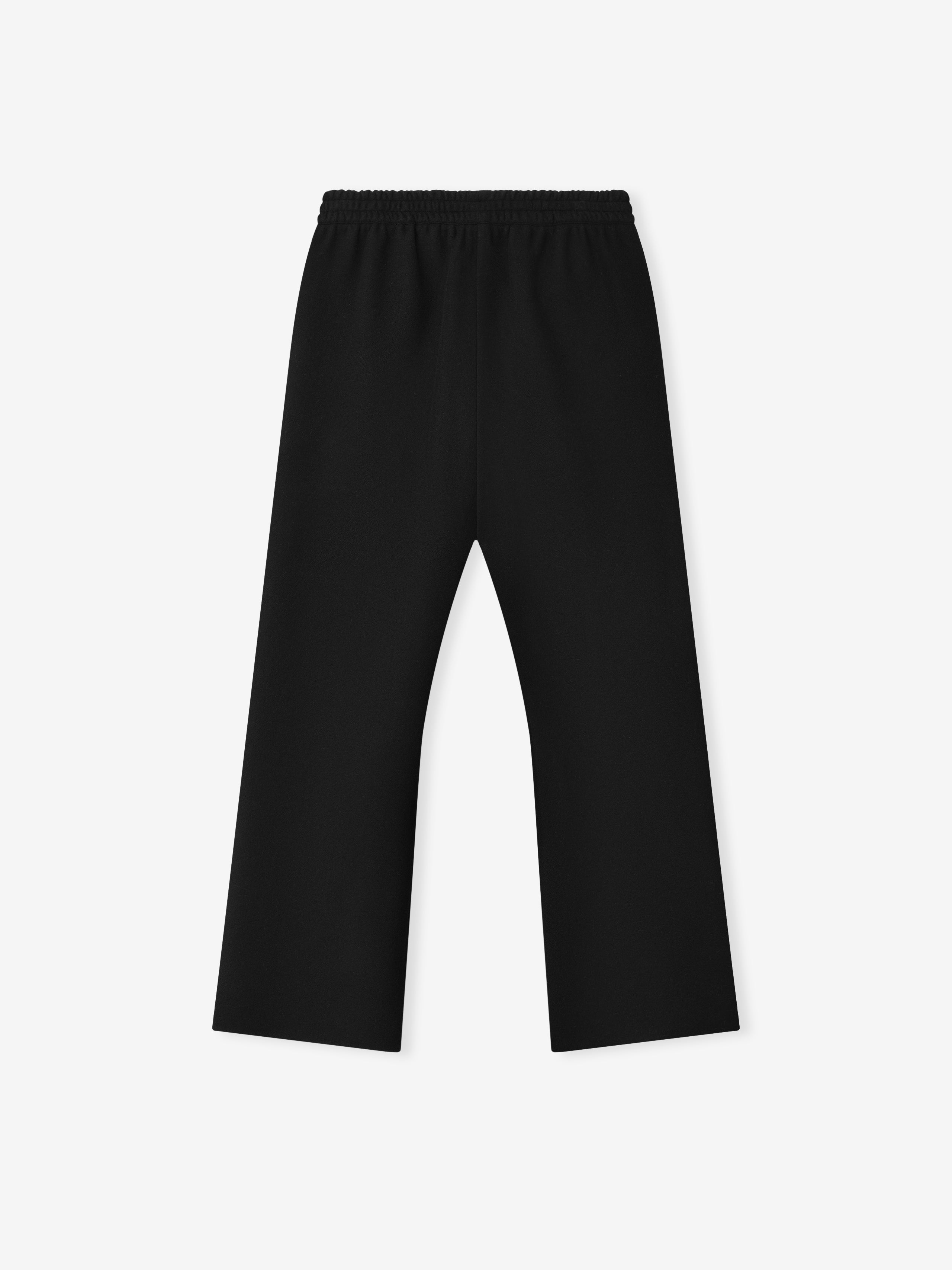black double face wool cashmere flared pants with elastic waistband laid flat on light background