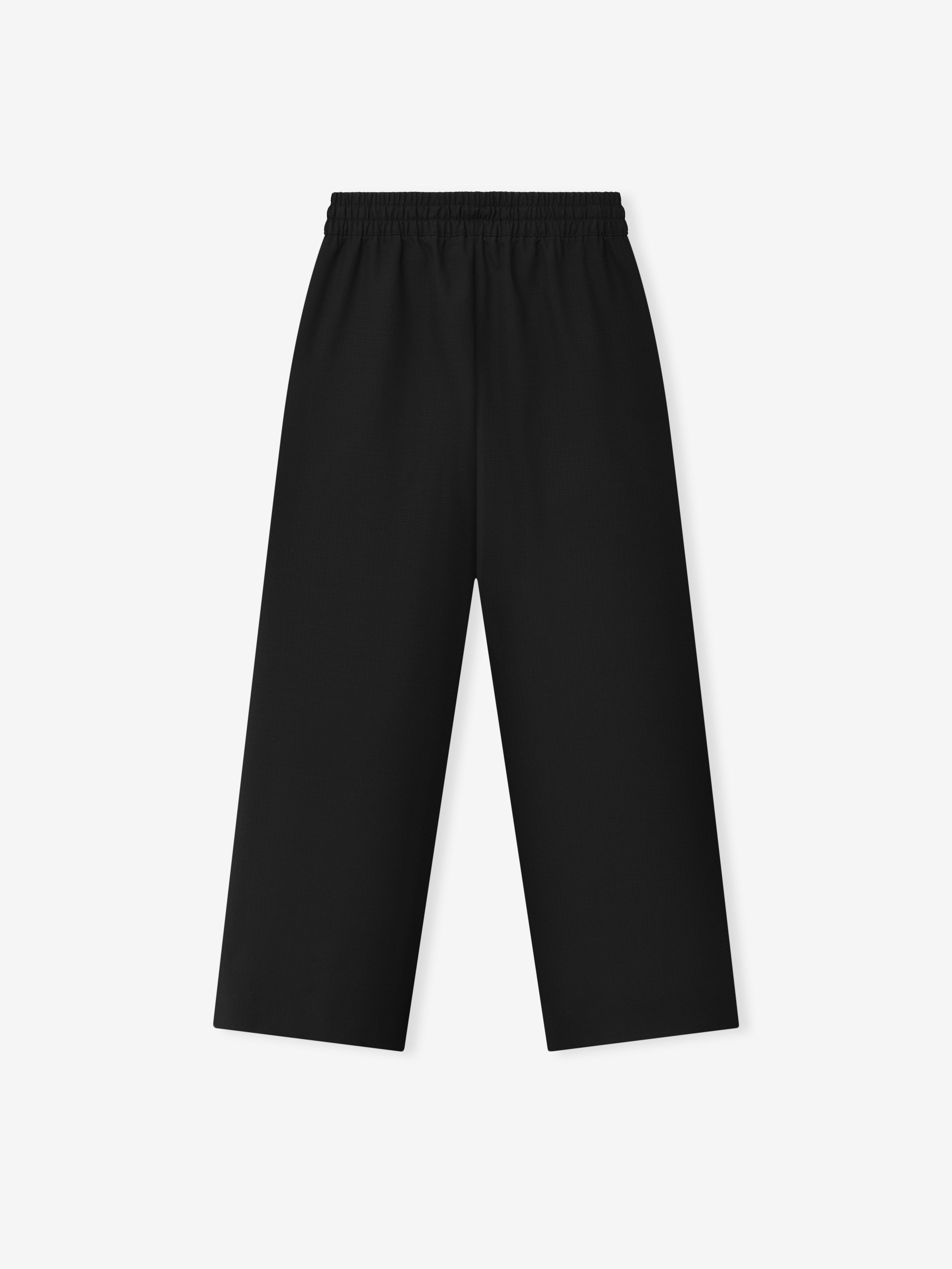 black wide-leg ripstop virgin wool pants with elasticated waistband and relaxed silhouette viewed from front
