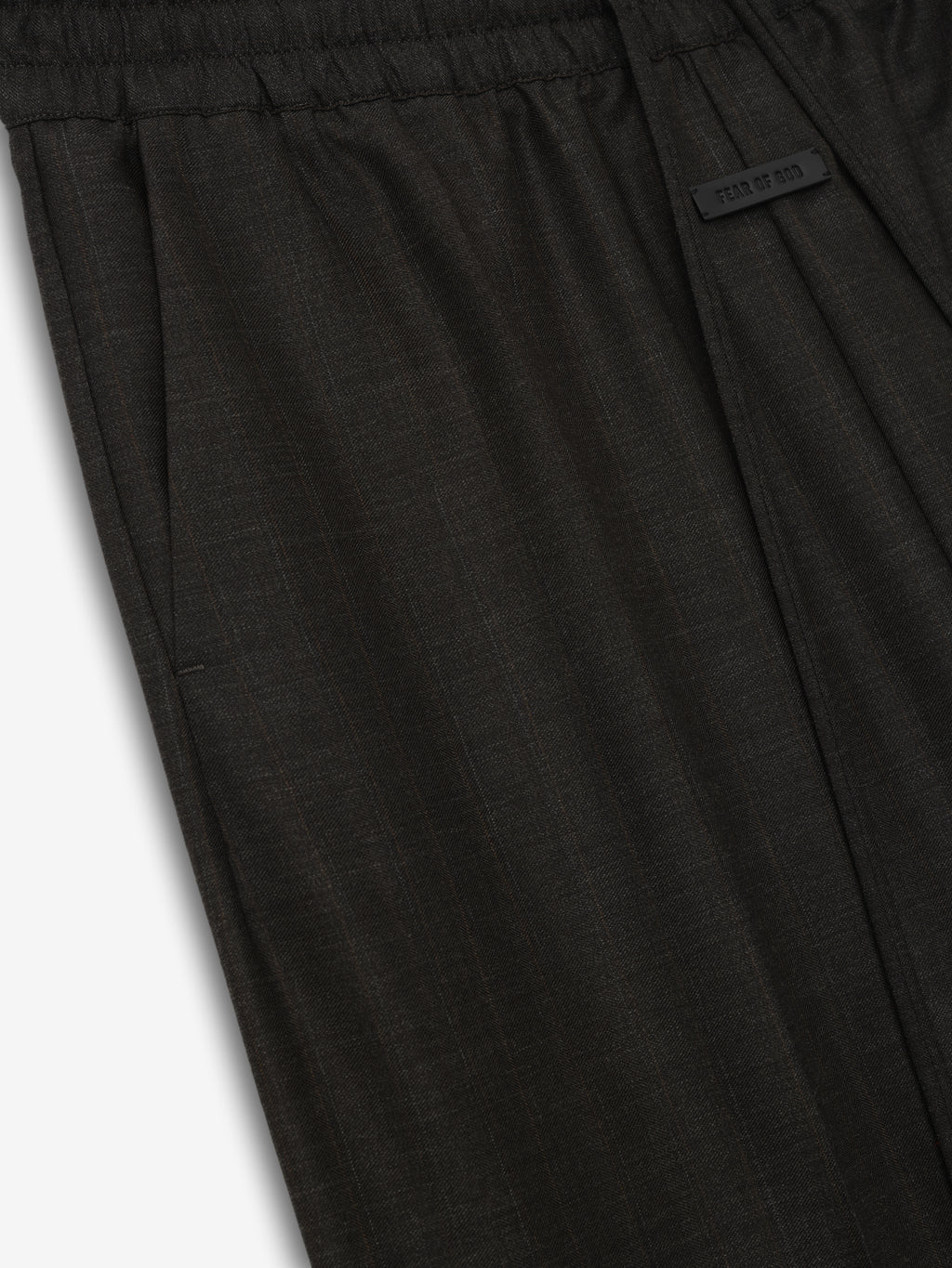 dark charcoal wide-leg wool pants with elastic waistband and adjustable drawstring featuring subtle texture and side pockets detail