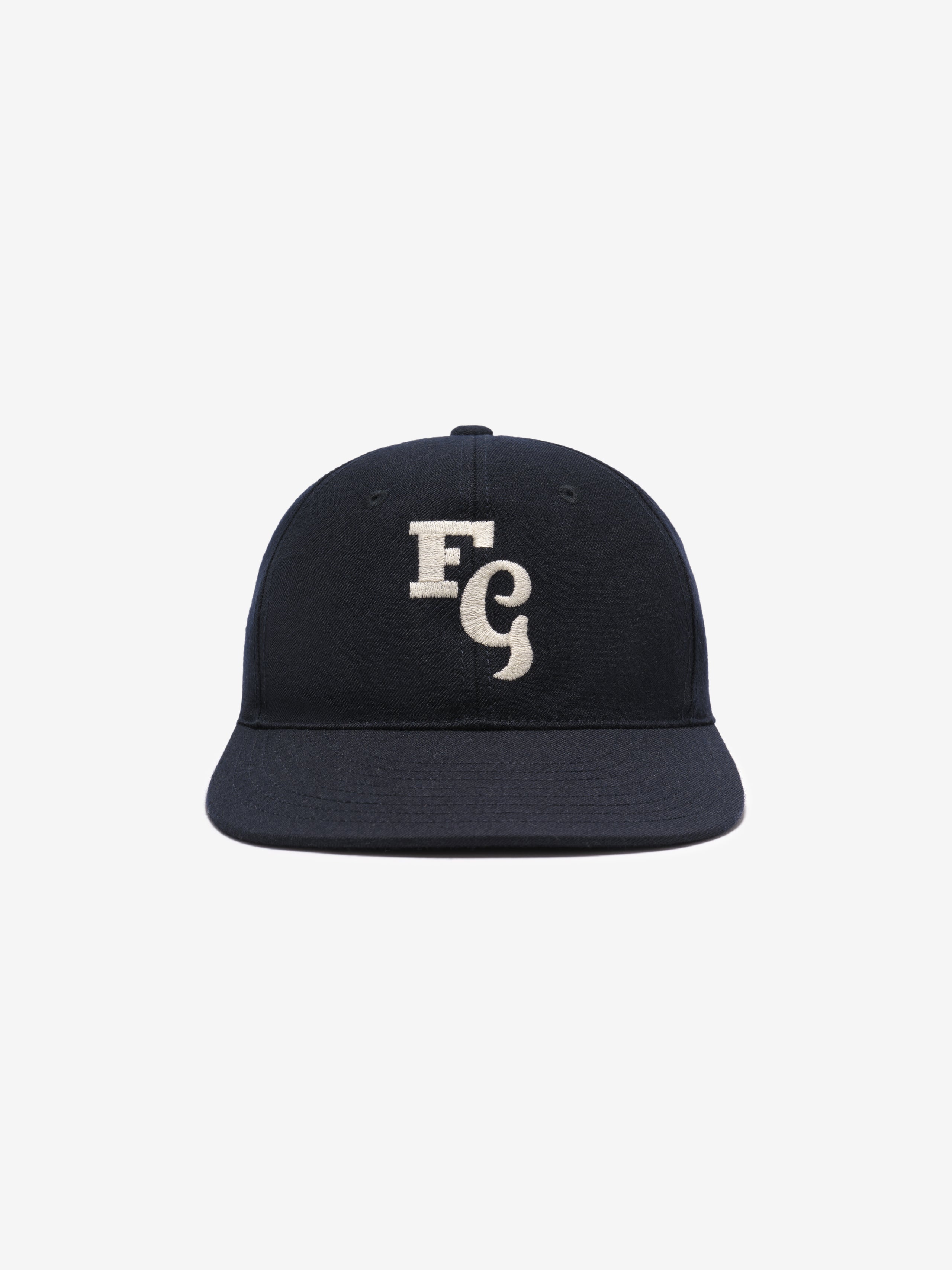 black textured wool baseball cap with white felt FG stitched logo on front and adjustable elastic back band