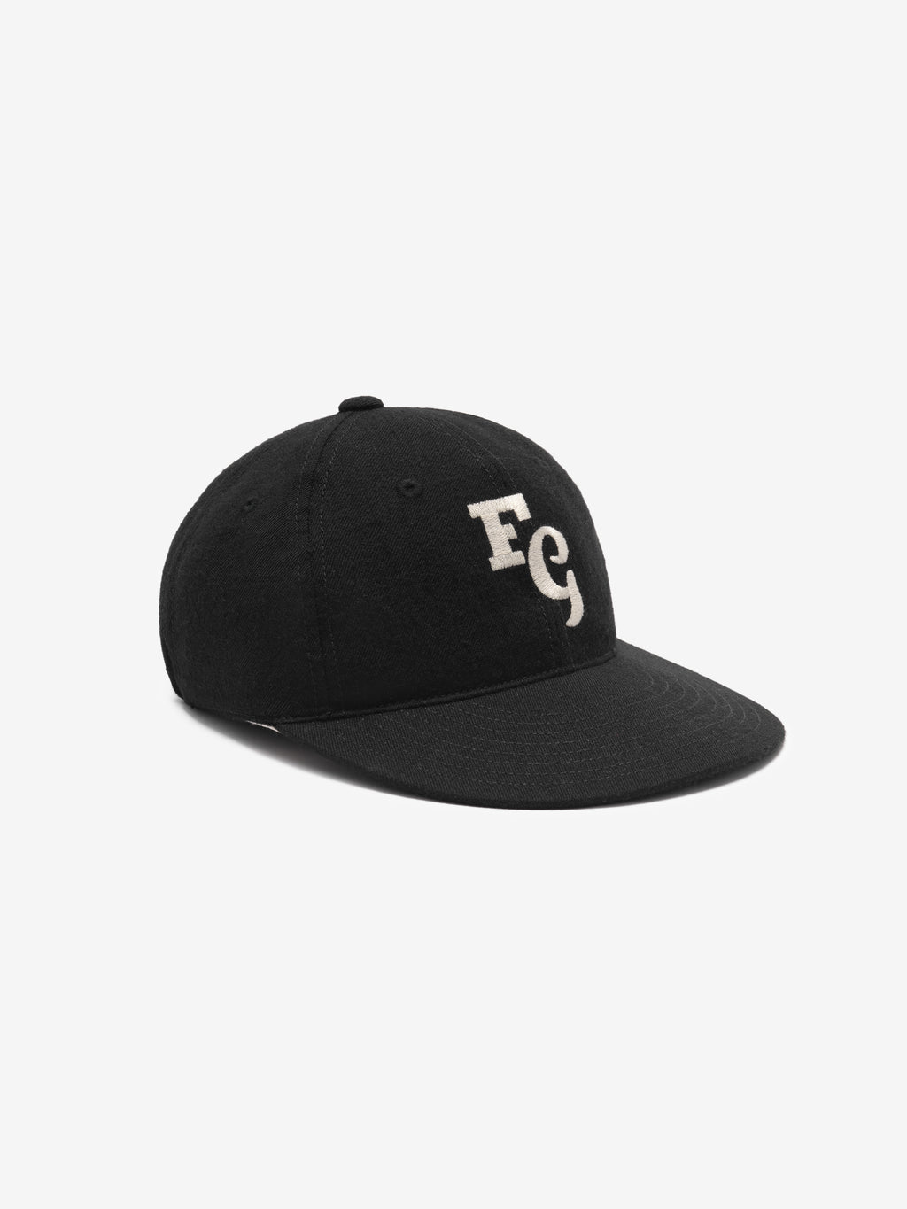 black wool baseball cap with cream FG felt stitched logo on front and curved brim with adjustable elastic back strap