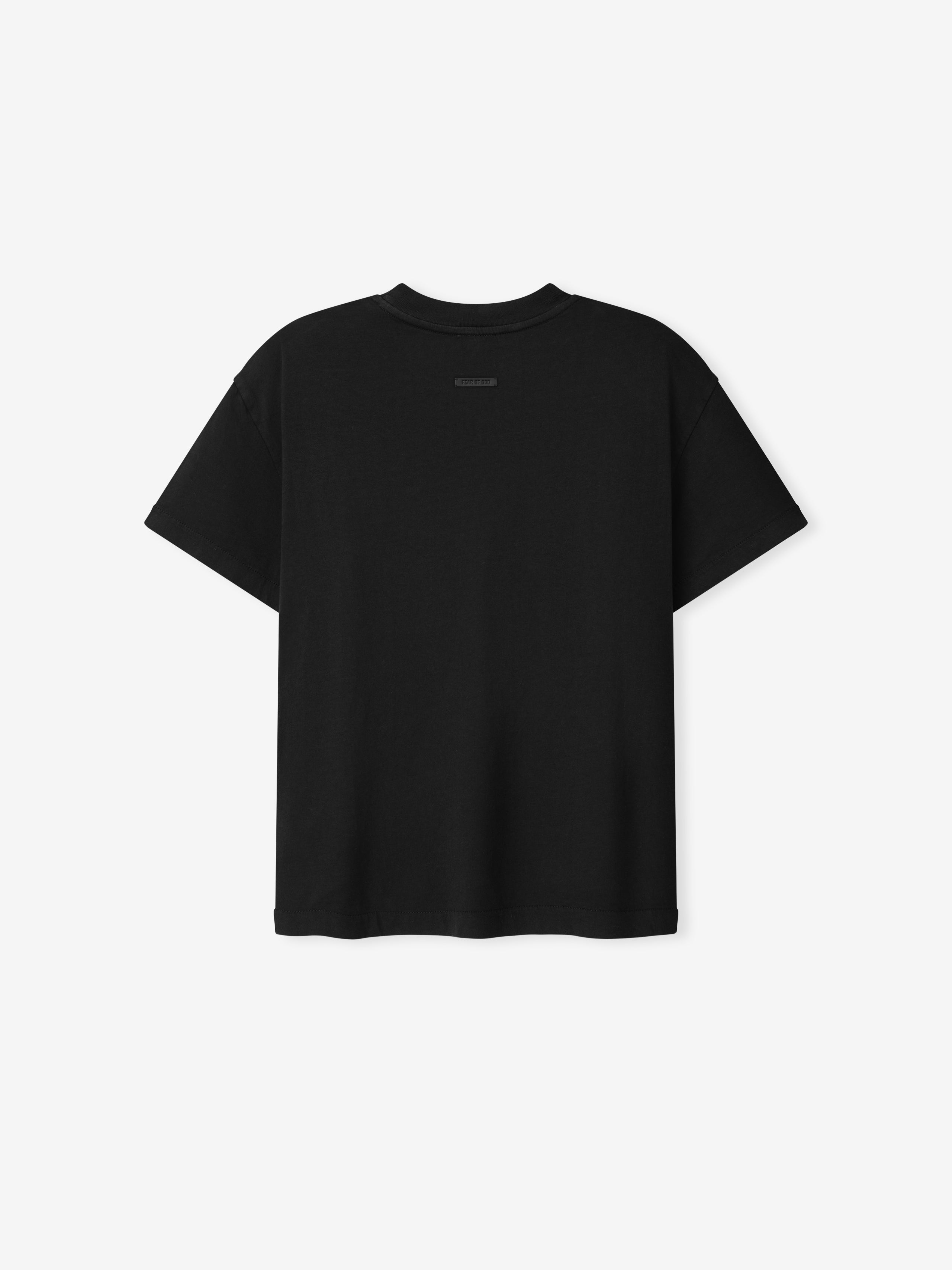 Back view of a plain black short-sleeve t-shirt with a small rectangular label near the neckline